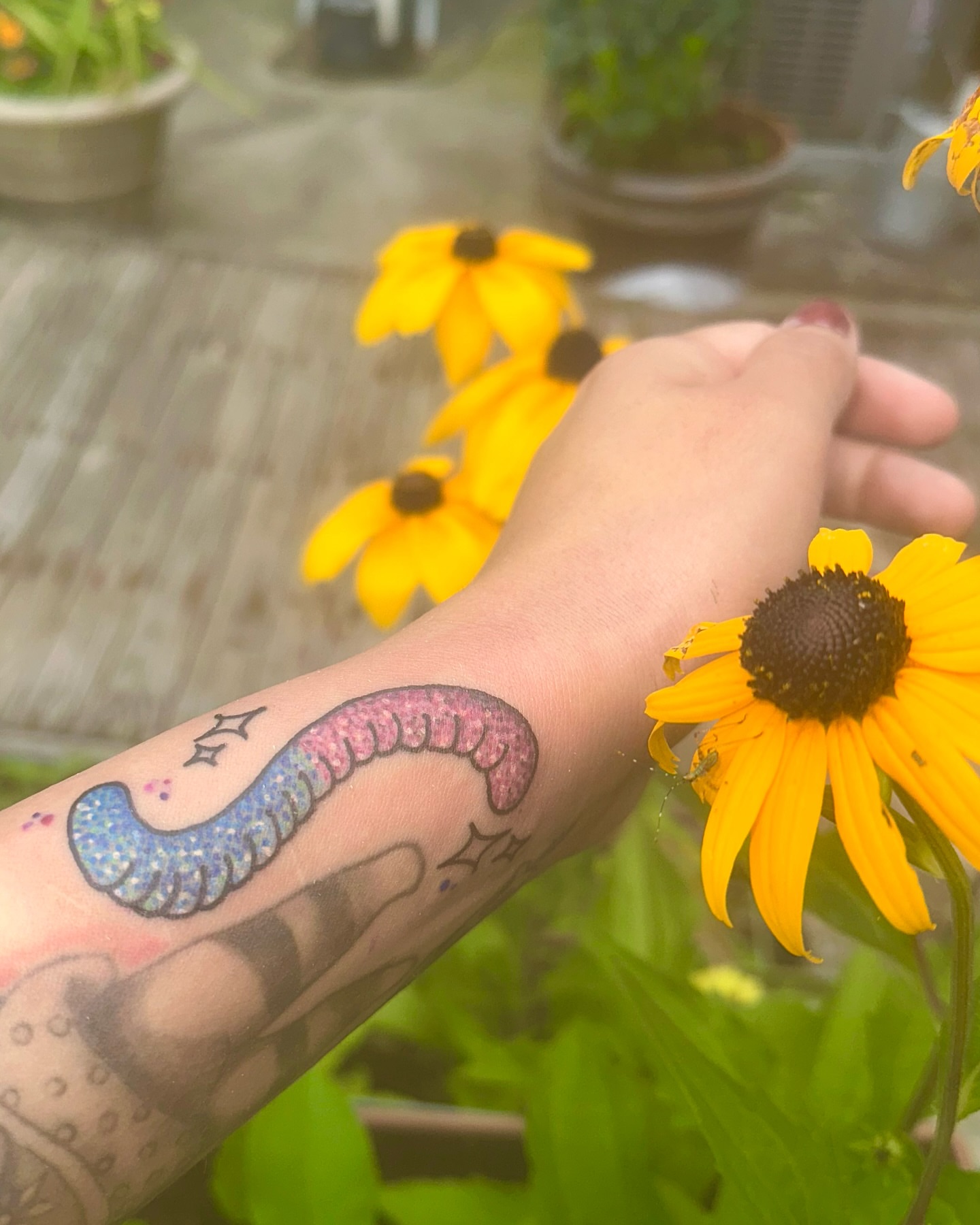 Worm dotwork tattoo on the forearm by Carly🪲 greensboro tattoo artist, Greensboro, North Carolina