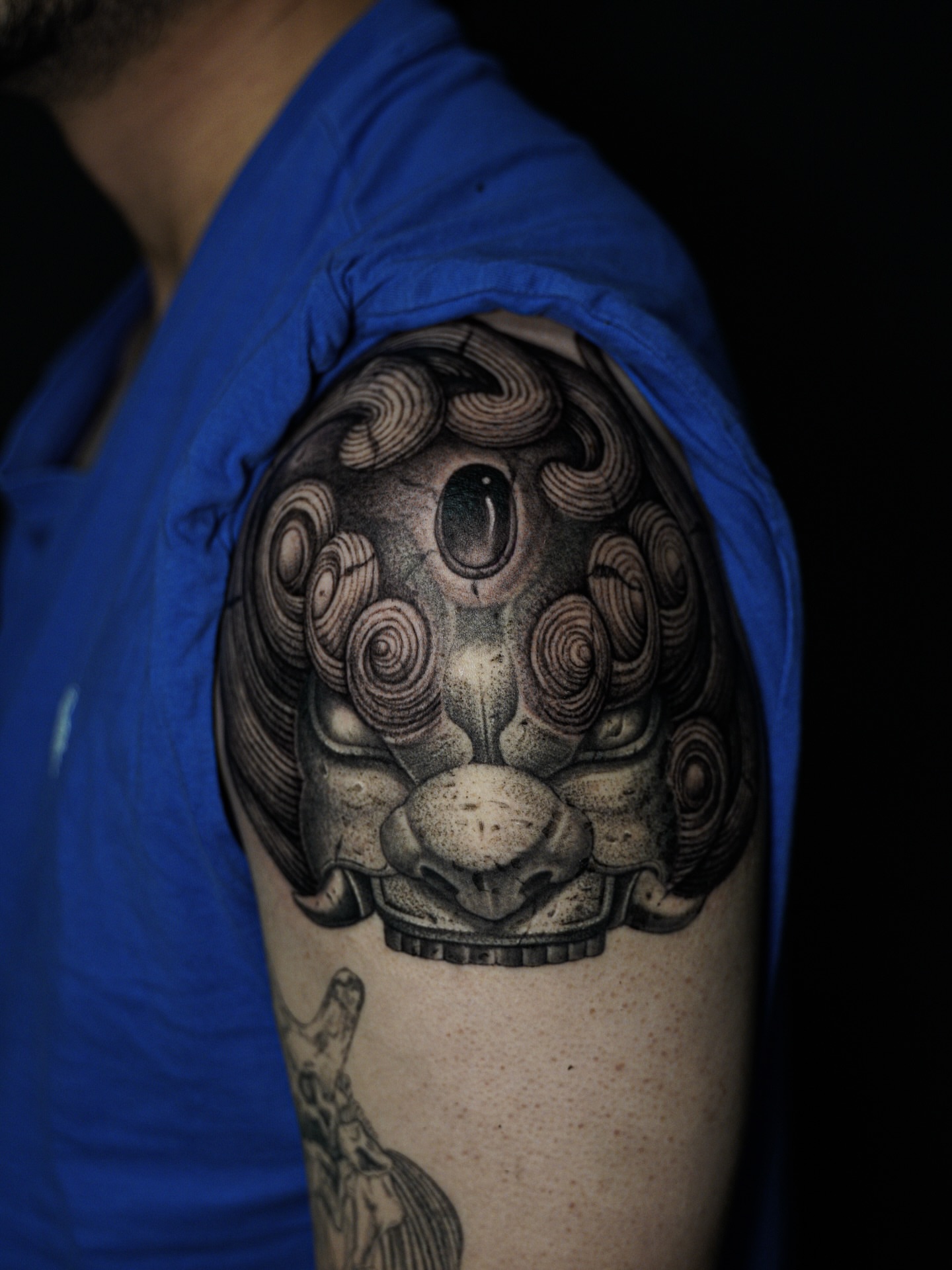 Lion head realism tattoo on the shoulder by Anh Nguyen