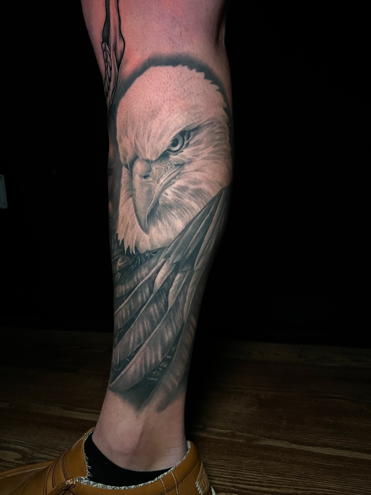 Eagle realism tattoo on the calf by Matt Misiak