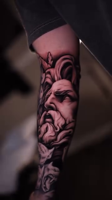 Greek god with Cerberus realism tattoo by Esto