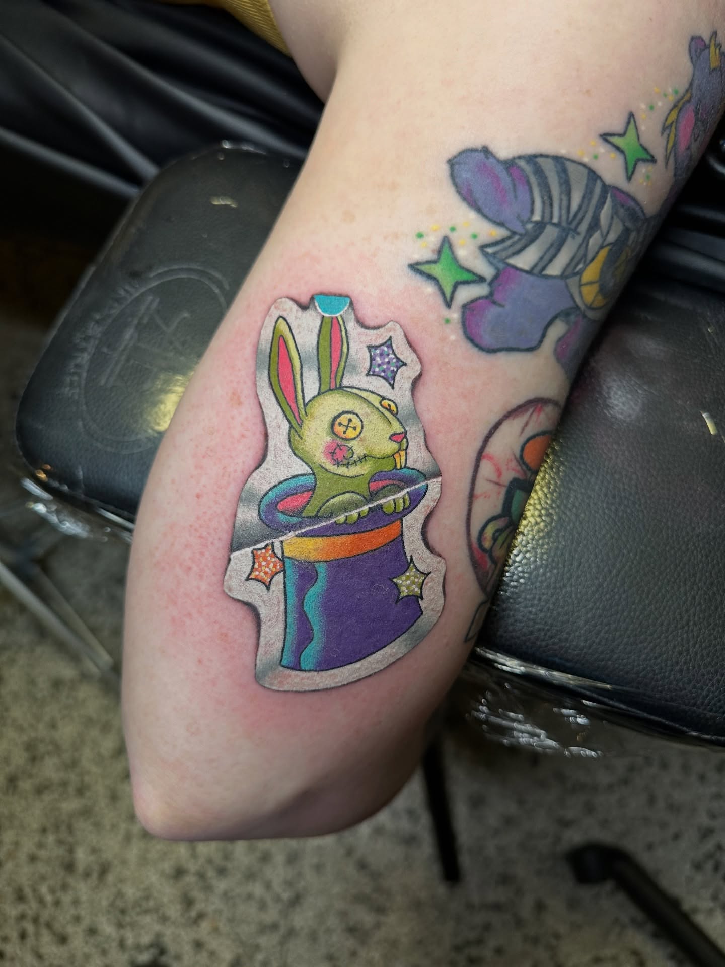 Rabbit in magician's hat American traditional tattoo on the forearm by (Joshua) Van Cummings