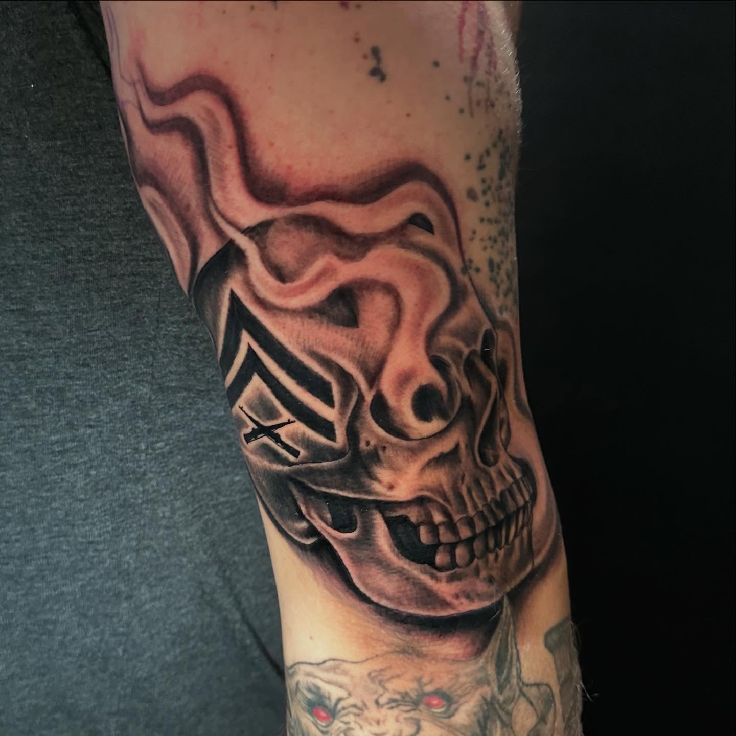 Smoking skull dark realism tattoo on the forearm by George Zabala, Rockdale, Illinois