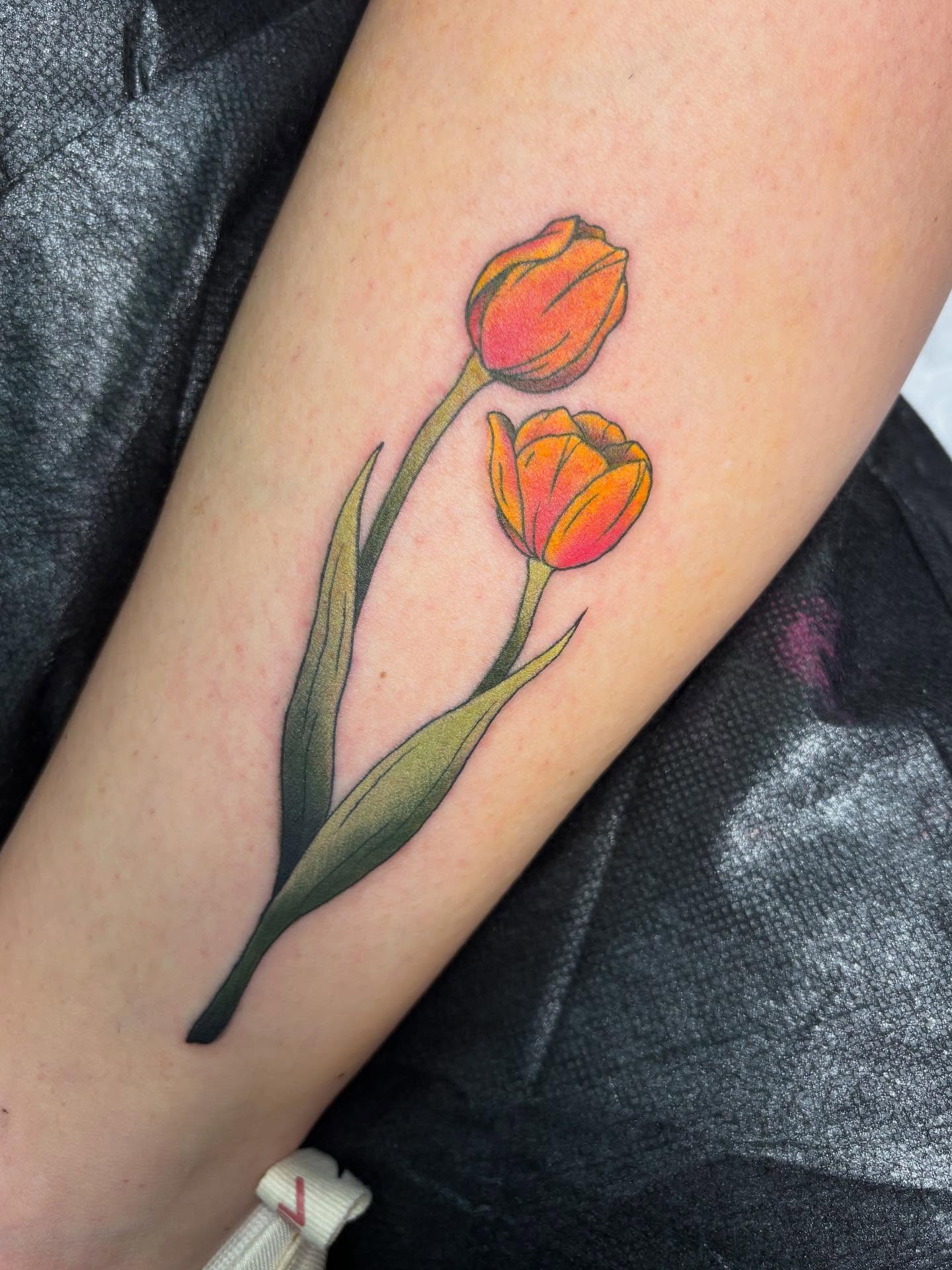 Tulips realism tattoo on the forearm by gia❤️‍🔥🎲, Maryville, Tennessee