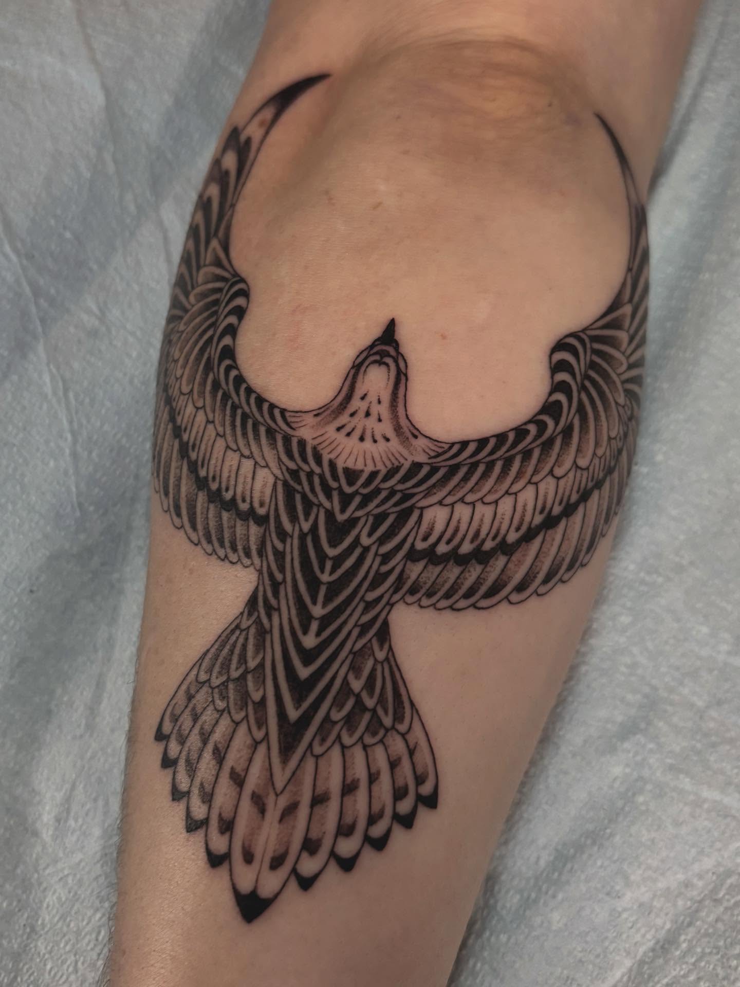 Swallow black and grey tattoo on the forearm by Jake Hodson, Nashville, Tennessee