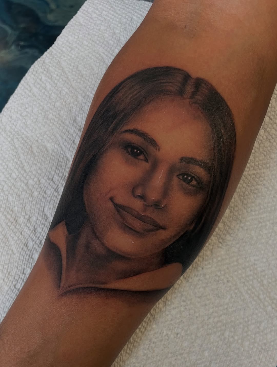 Portrait of a woman Chicano tattoo on the forearm by Jennifer Garcia