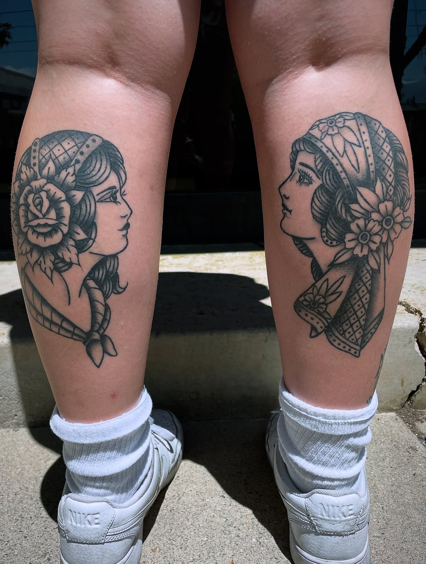 Woman's profile American traditional tattoo on the calf by Cam TallBoy SLC Tattoo Artist, Salt Lake City, Utah