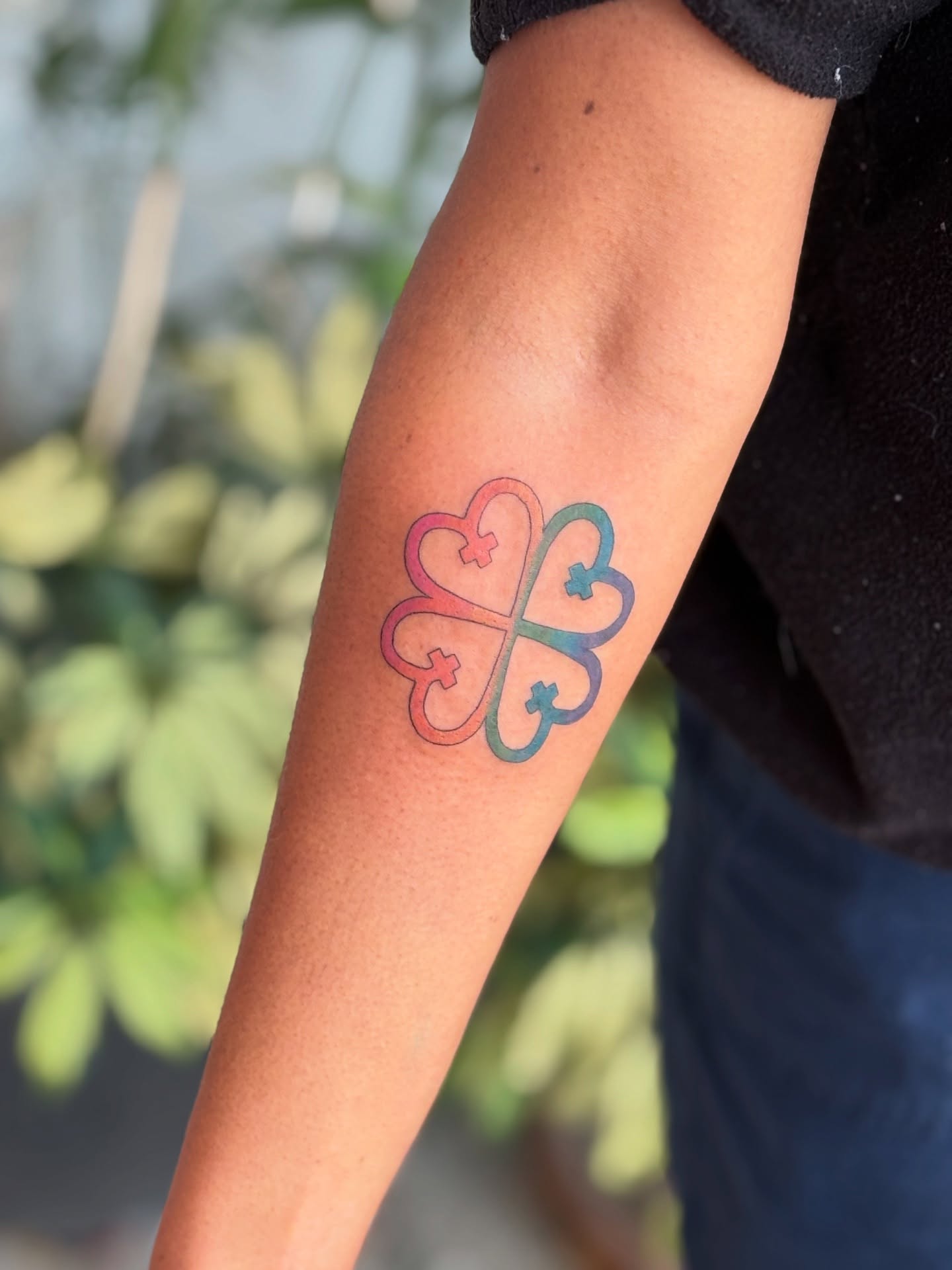 Four-leaf clover geometric tattoo on the forearm by ✨Dani Jackson✨, New Orleans, Louisiana