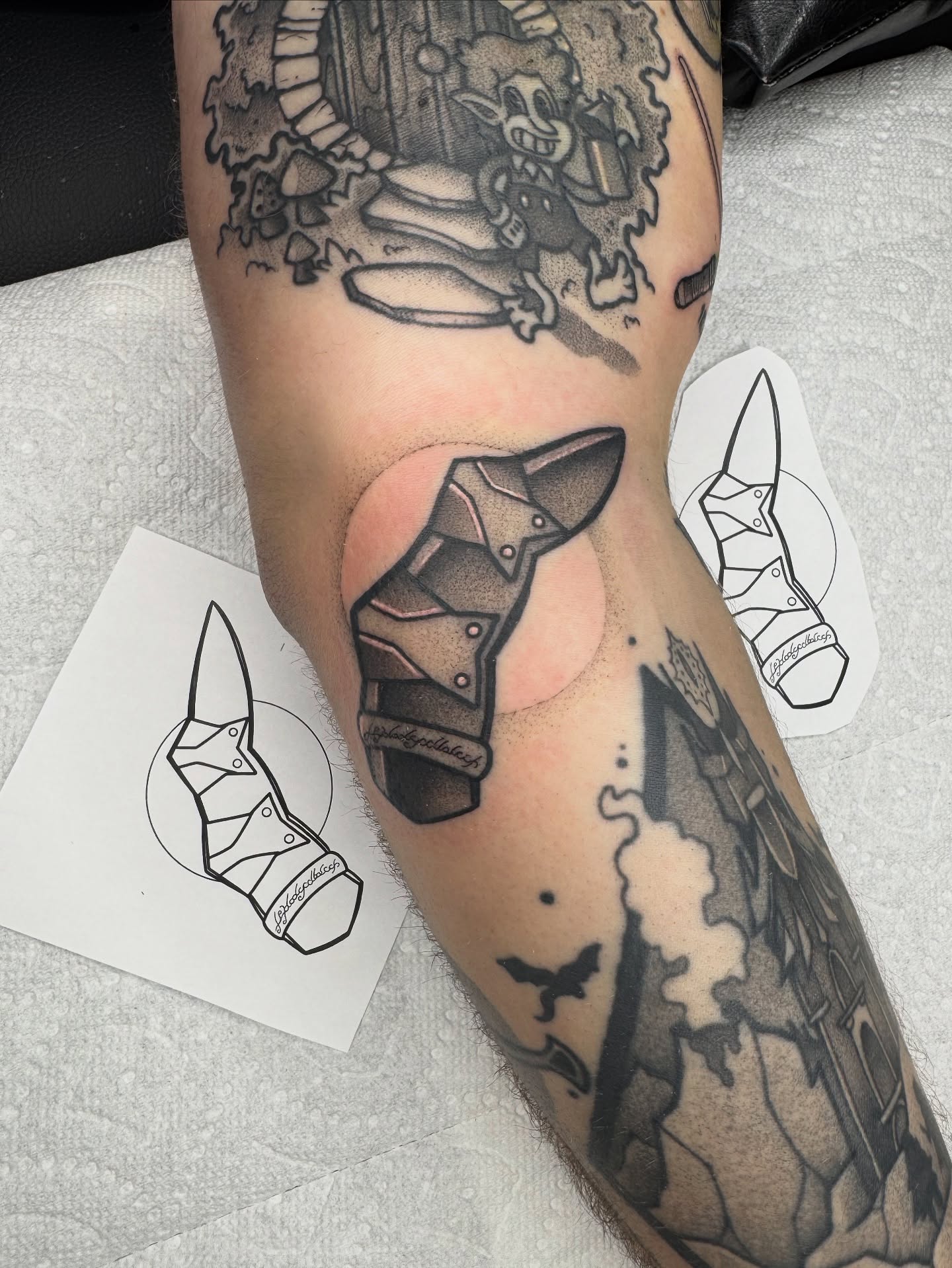 Knife black and grey tattoo on the forearm by Donnie Moore