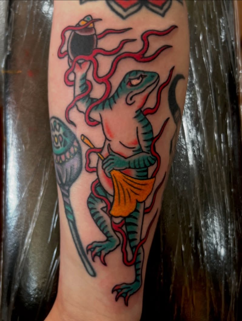Lizard with tentacles American traditional tattoo on the forearm by Rocky Burley, Georgetown, Texas