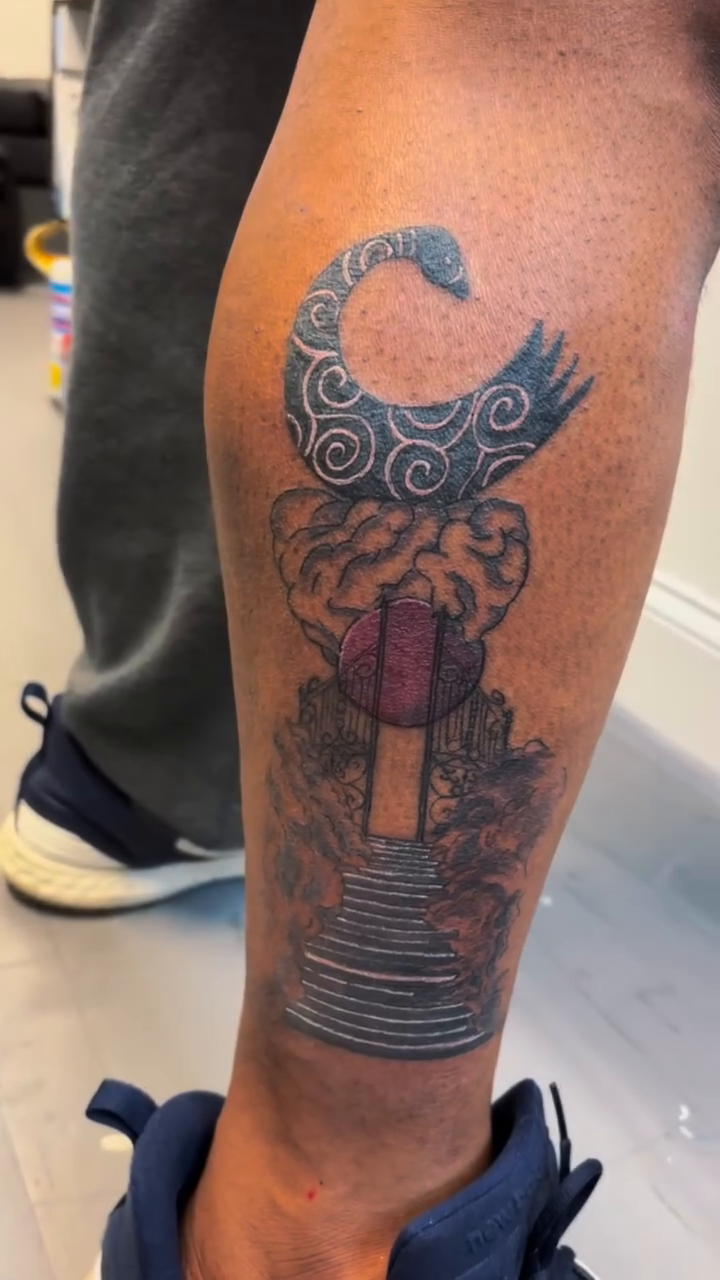 Lantern and stairs with clouds surrealism tattoo on the forearm by Lopez Dautruche
