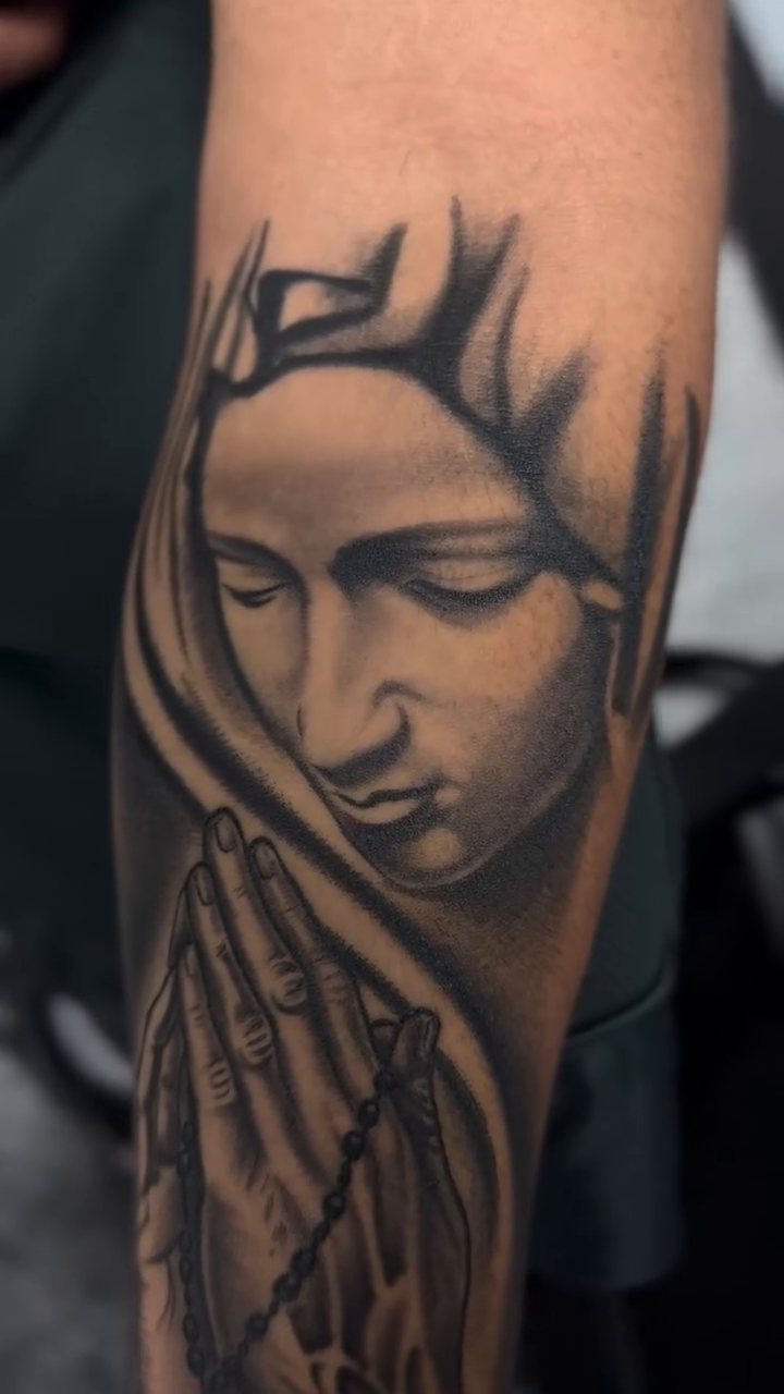 Virgin mary and praying hands realism tattoo by Alex Romero