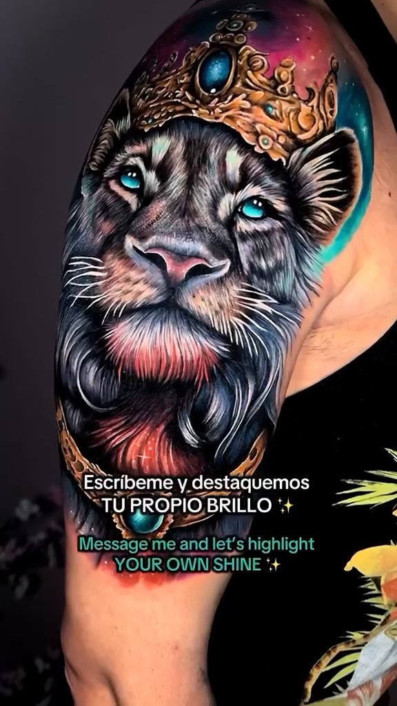 Lion with crown watercolor tattoo on the upper arm by Kaly, Manhattan, NYC