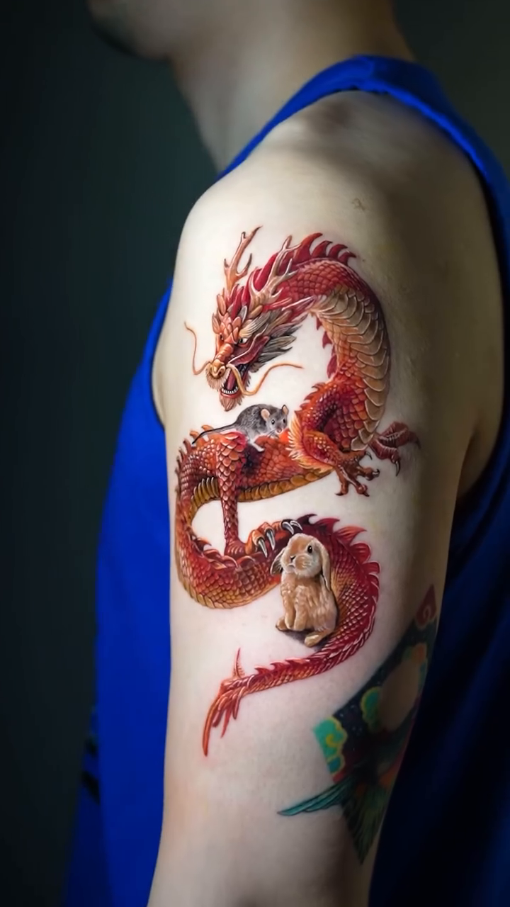 Dragon with small animals japanese irezumi tattoo by Eun, Toronto, Ontario