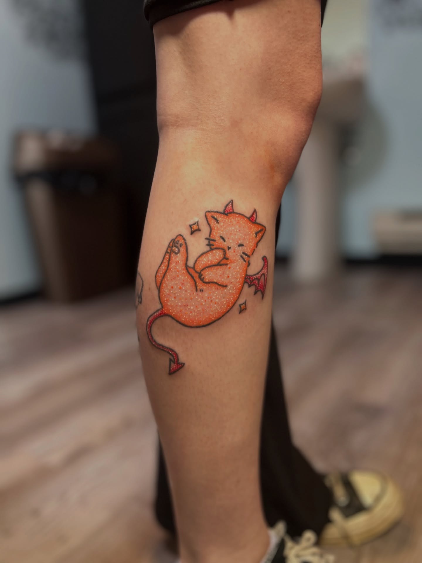 Cat dotwork tattoo on the forearm by Kiersten Tickle