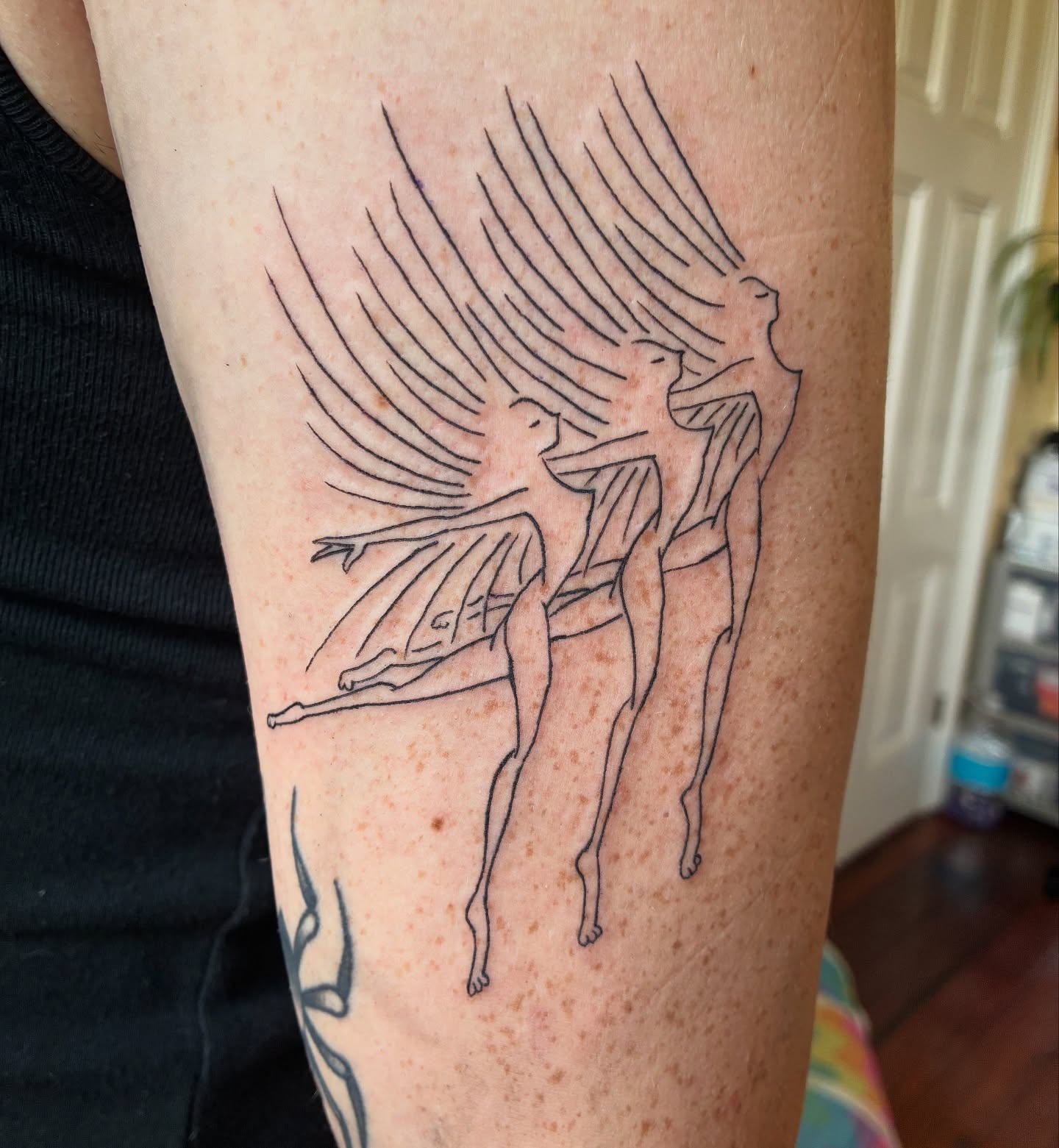 Dancers fine line tattoo on the forearm by Steph Liebetreu