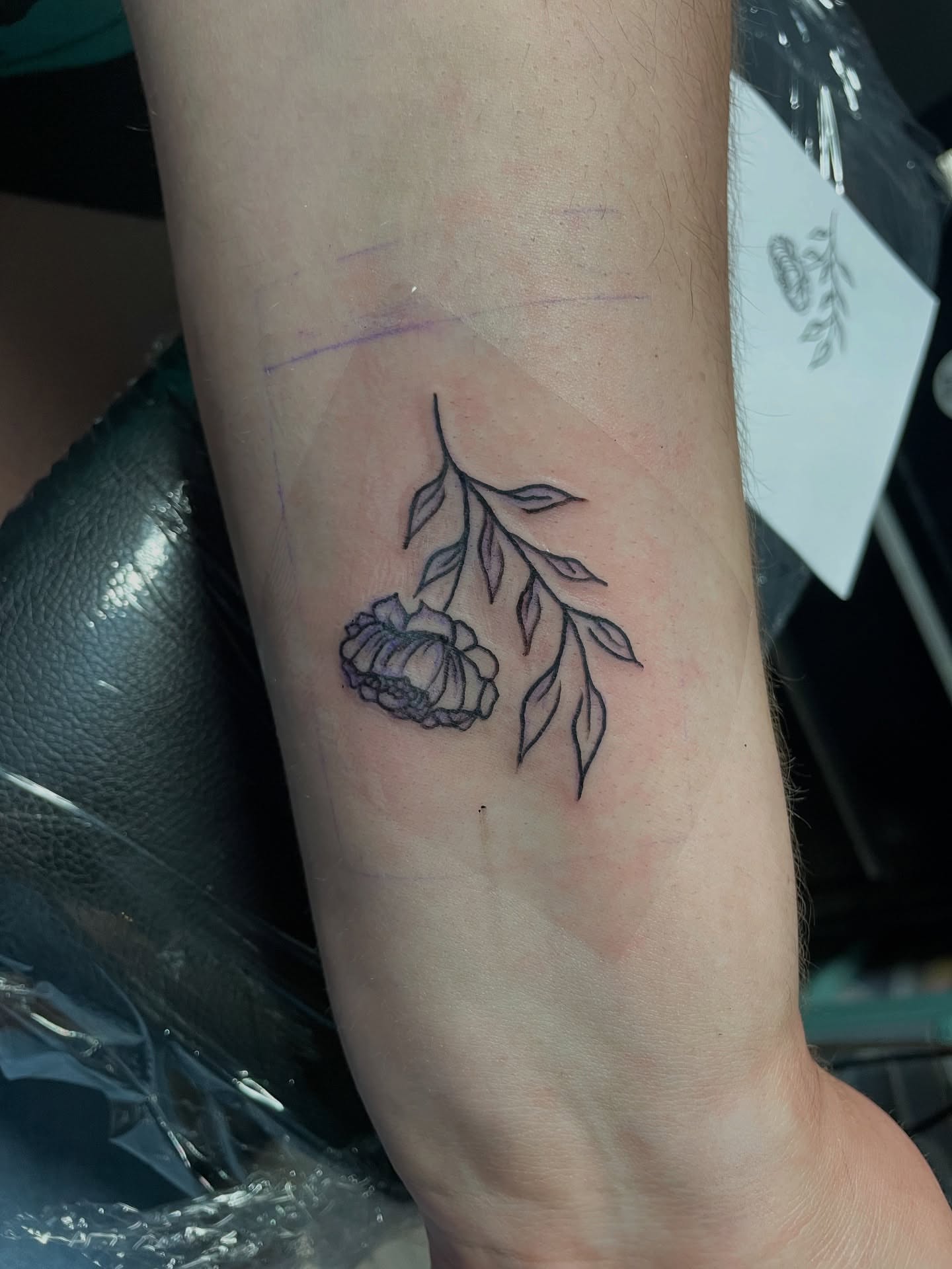 Flower and branch black and grey tattoo on the forearm by Vanessa - Dallas Artist