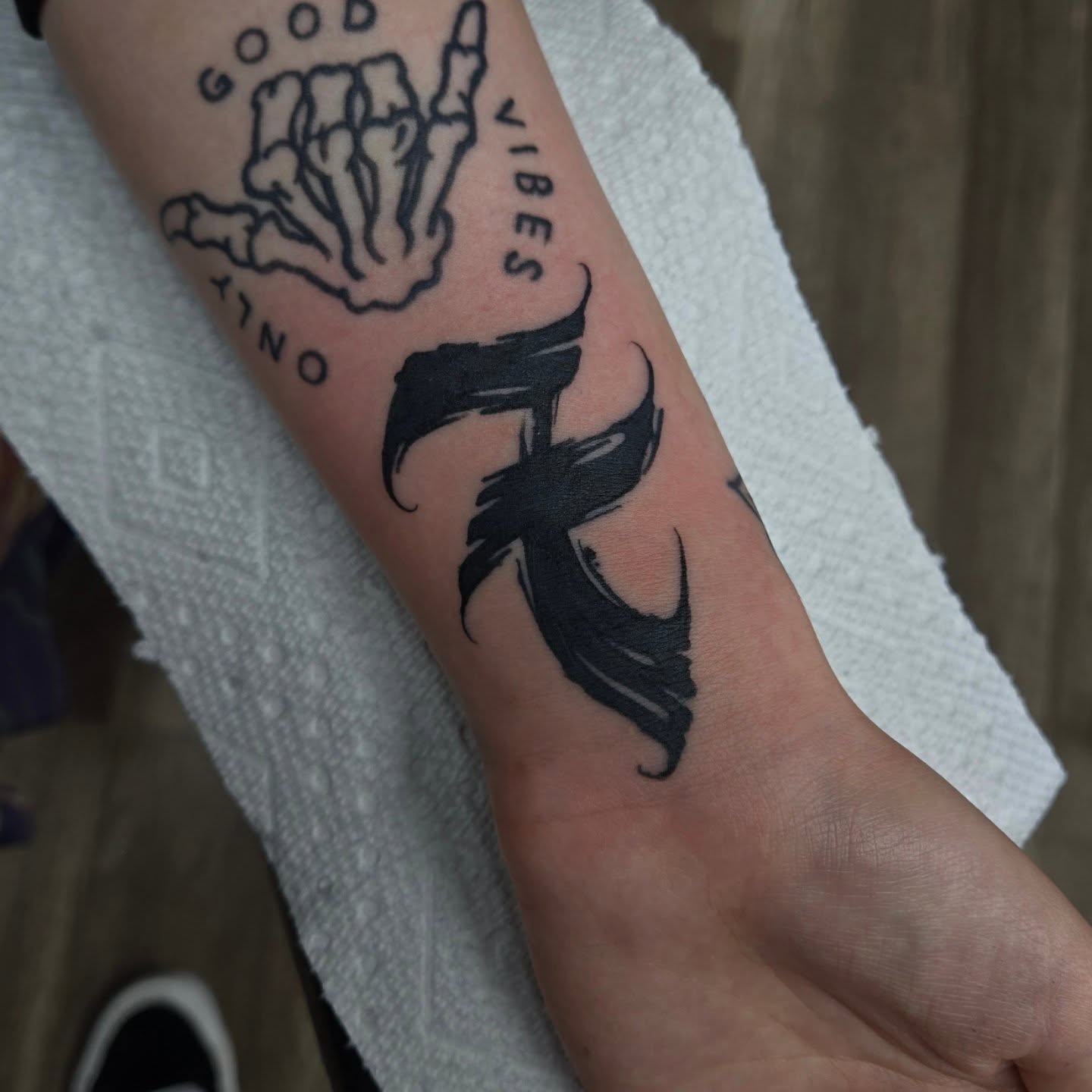 Good vibes black and grey tattoo on the forearm by DiazTattoos, Denver, Colorado