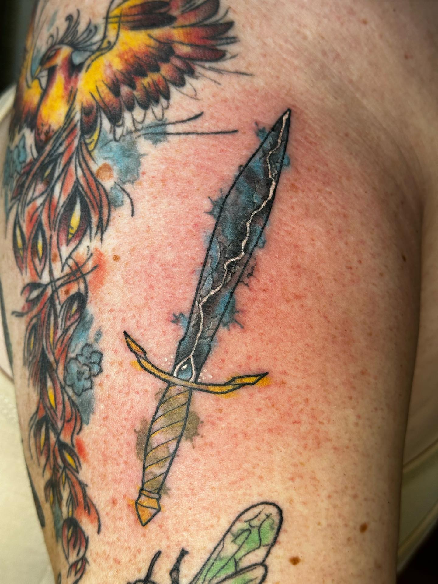Sword American traditional tattoo on the upper arm by SAL, Mesa, Arizona