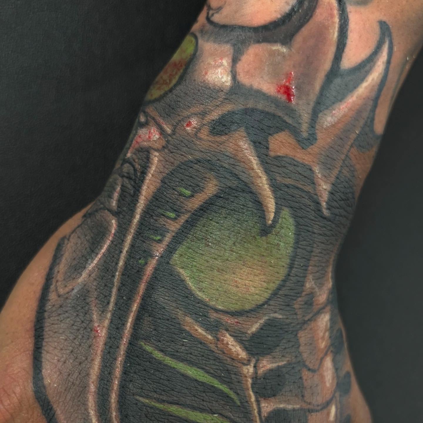 Abstract design black and grey tattoo on the forearm by Rene Chavira