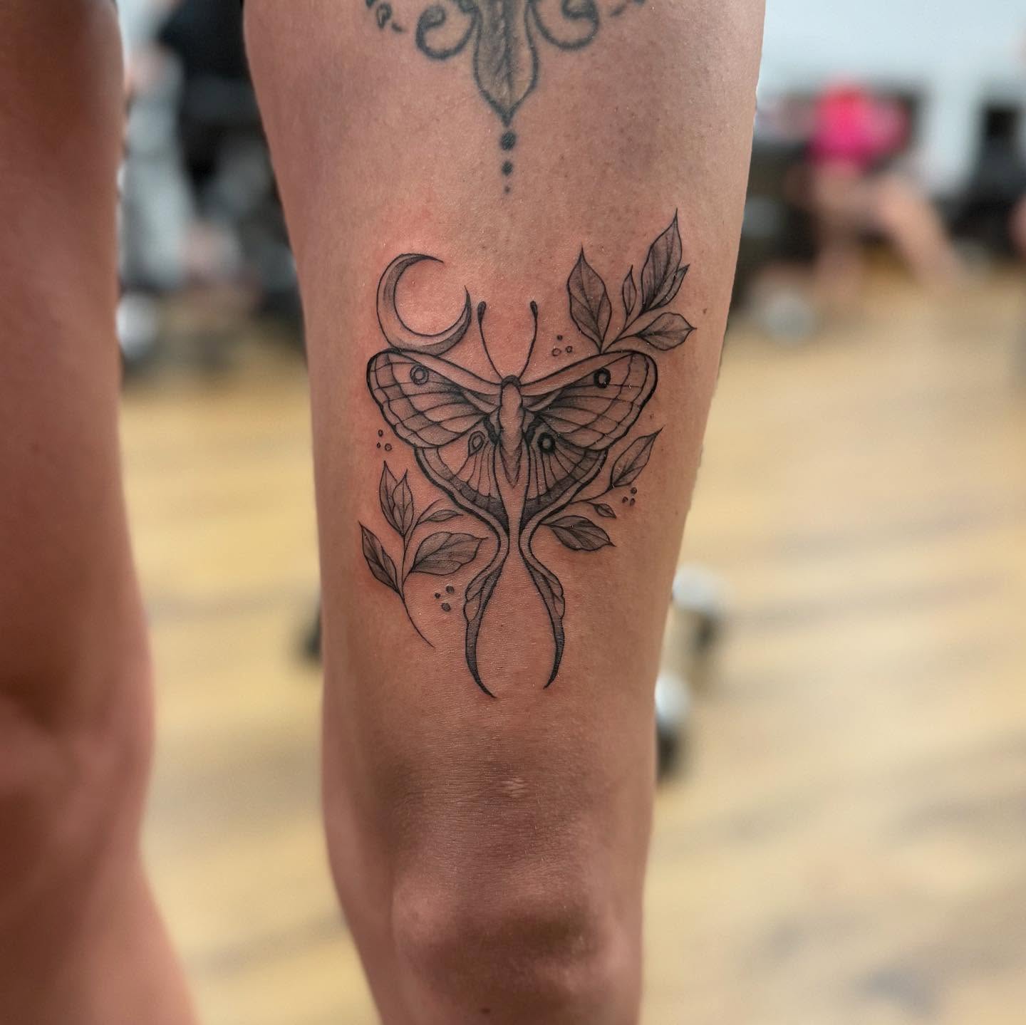 Butterfly black and grey tattoo on the forearm by Jocelyn