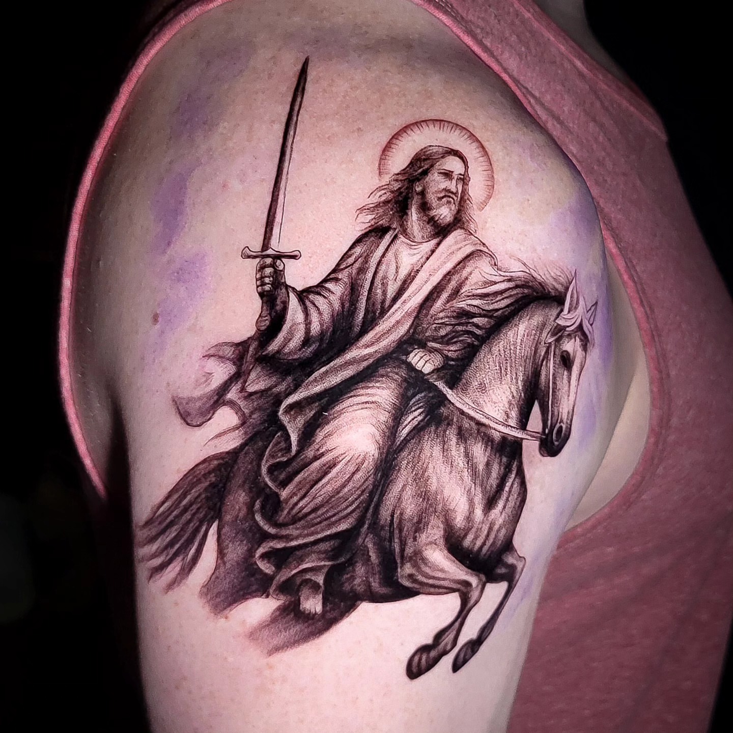 Jesus on horseback realism tattoo on the shoulder by Jesse TheTerrible