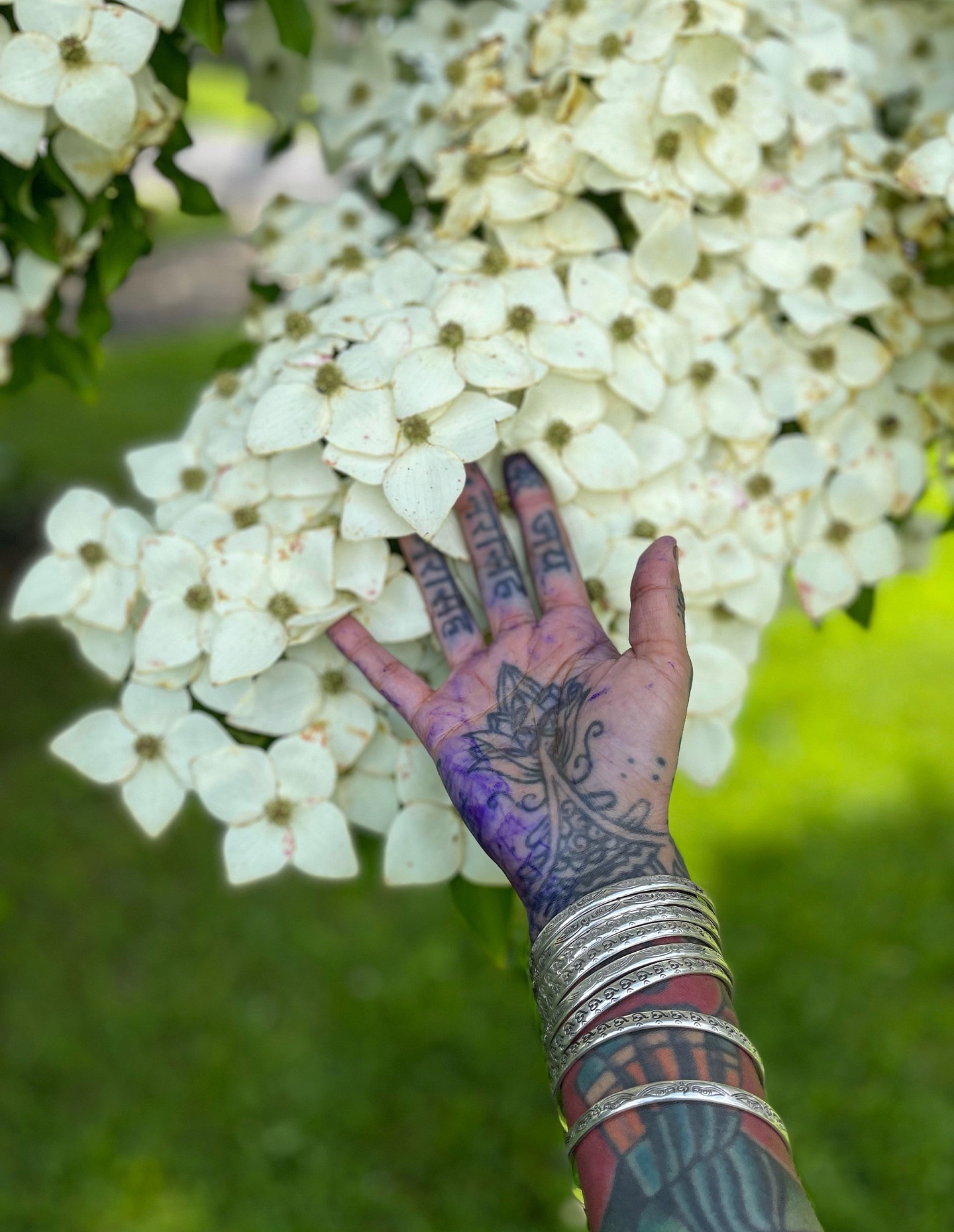 Lotus flower dotwork tattoo on the hand by Swasthik Iyengar, New York, New York
