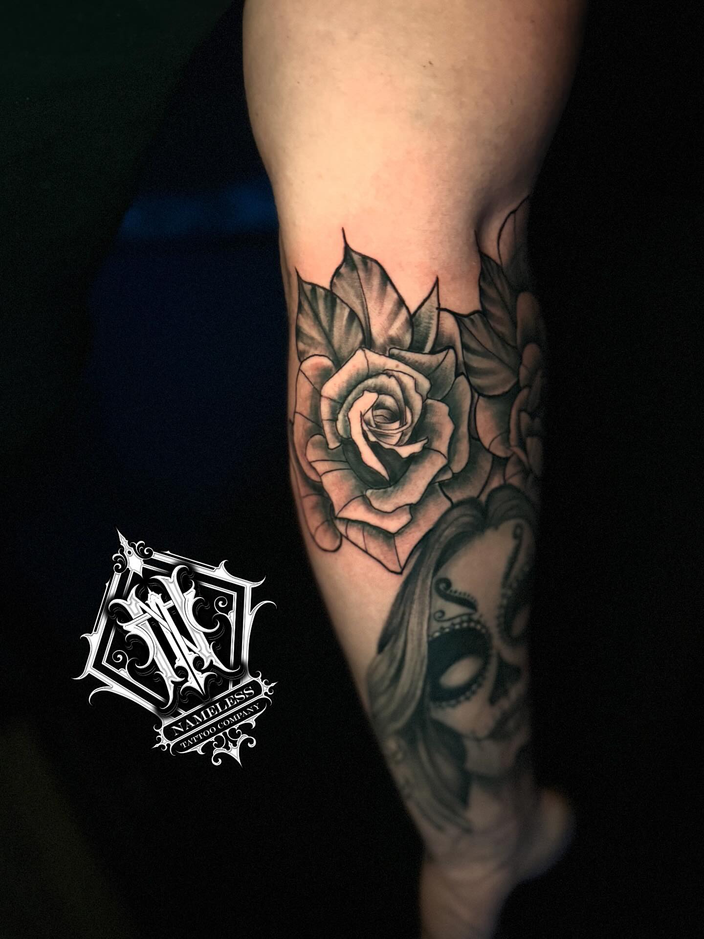 Rose black and grey tattoo on the forearm by AJ