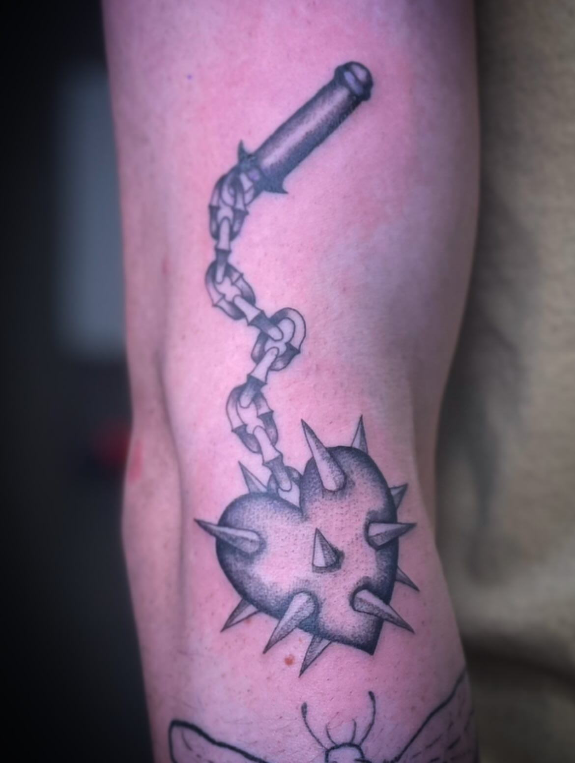 Spiked ball and chain black and grey tattoo on the forearm by ⊹ * . 𝕵az ⊹ * .