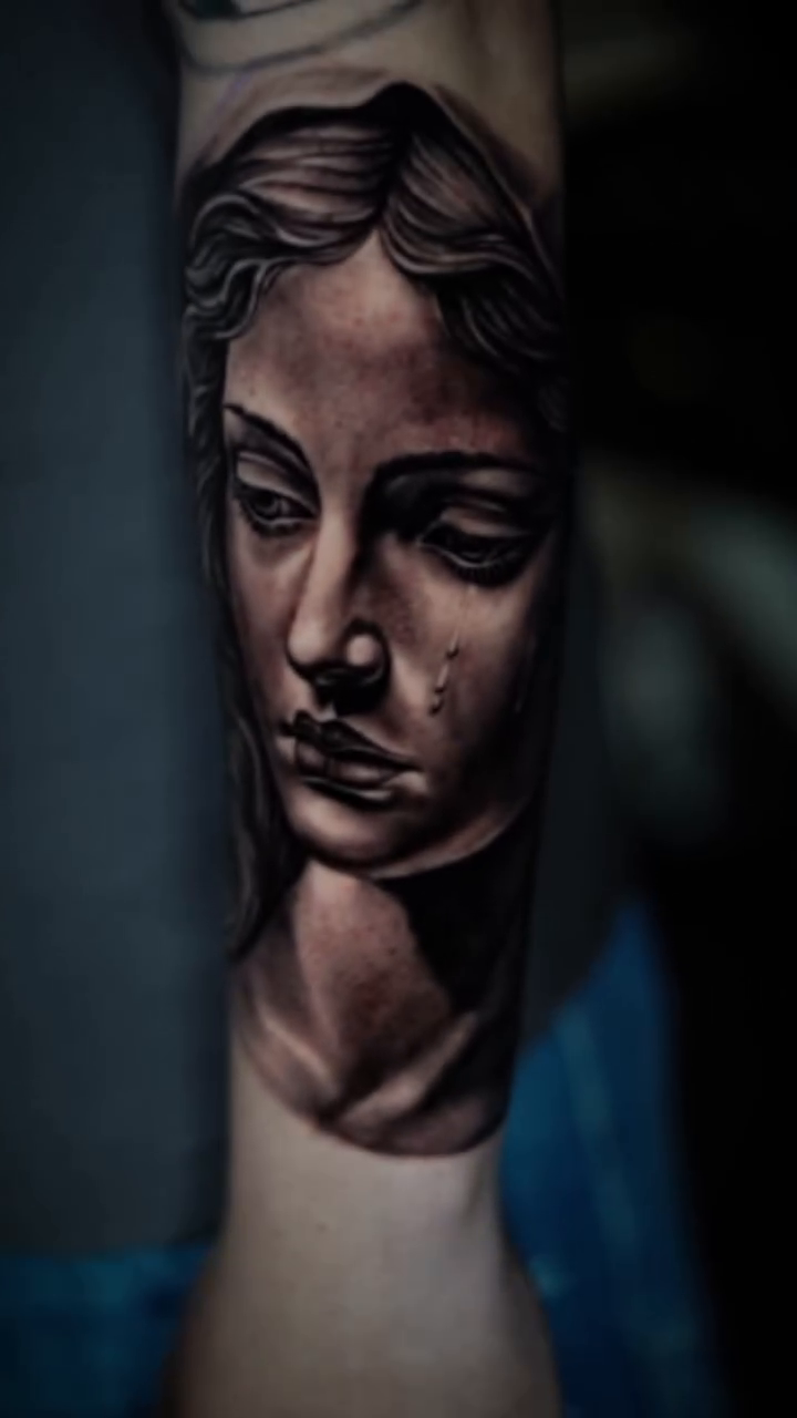 Tattoo by @angelo_tattooink — realism, black_and_grey