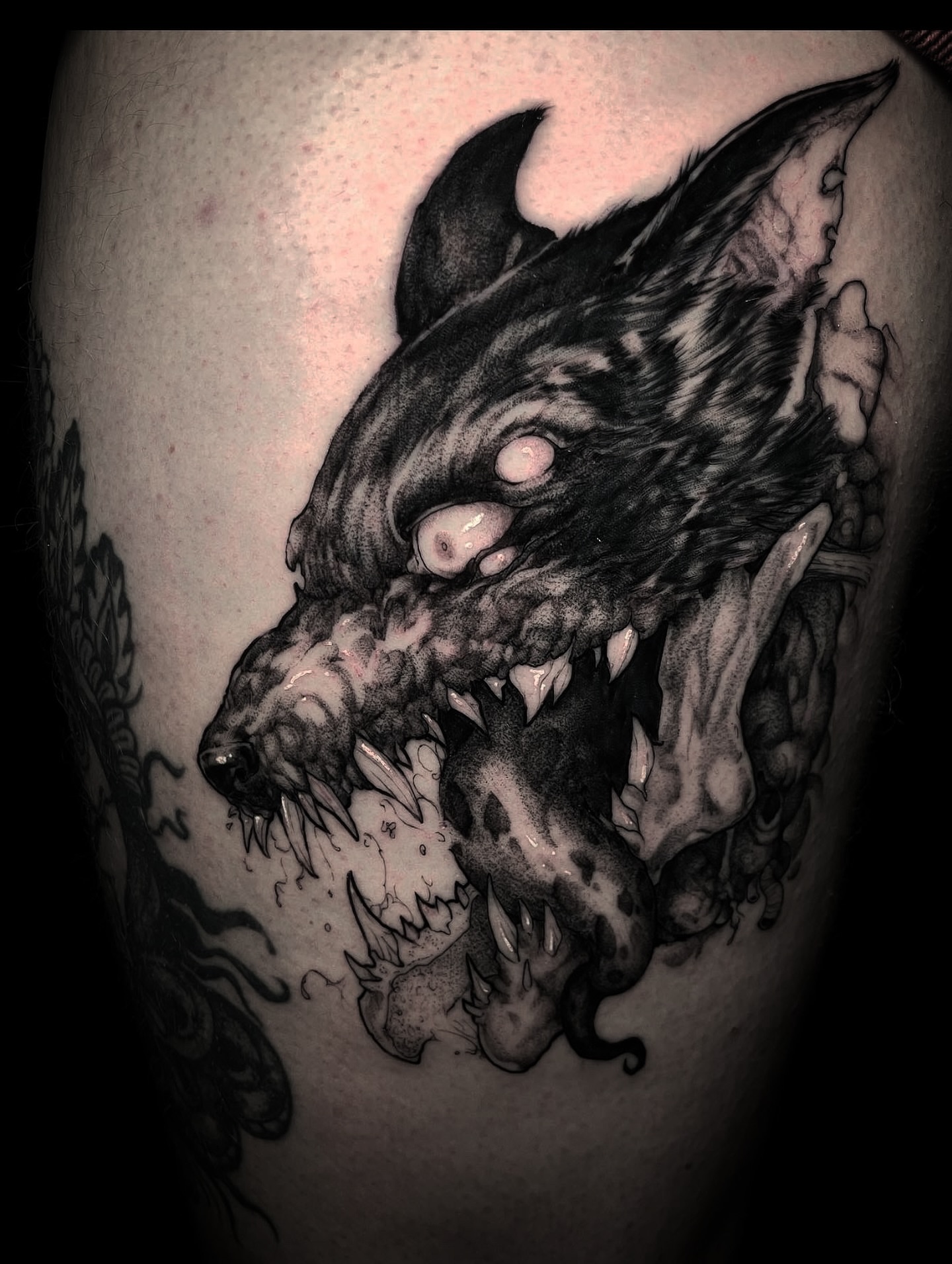 Demon head dark realism tattoo on the thigh by Xavi Xiva TATTOO