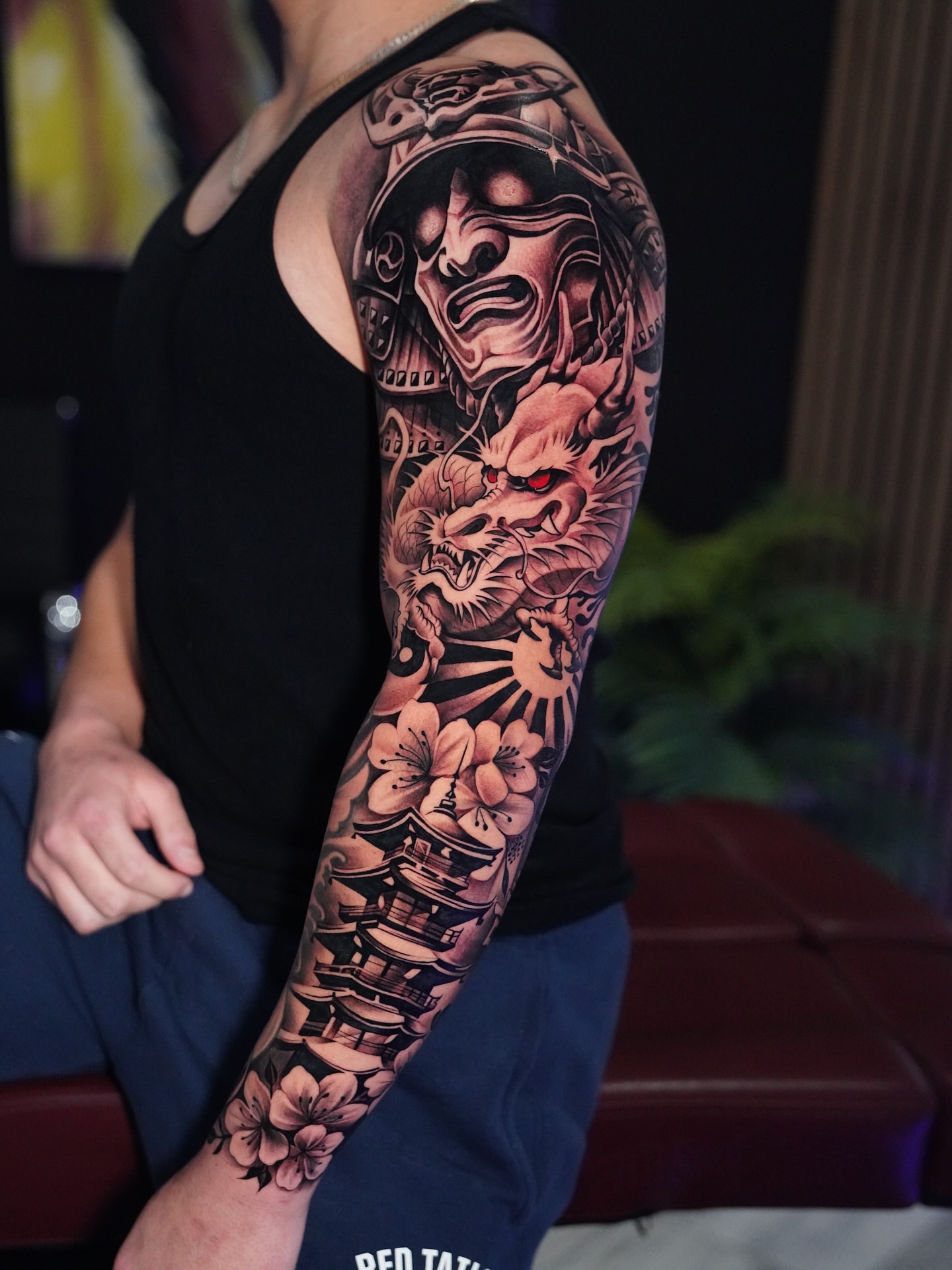 Samurai warrior and dragon japanese irezumi tattoo on the upper arm by Artem Kunakuzin