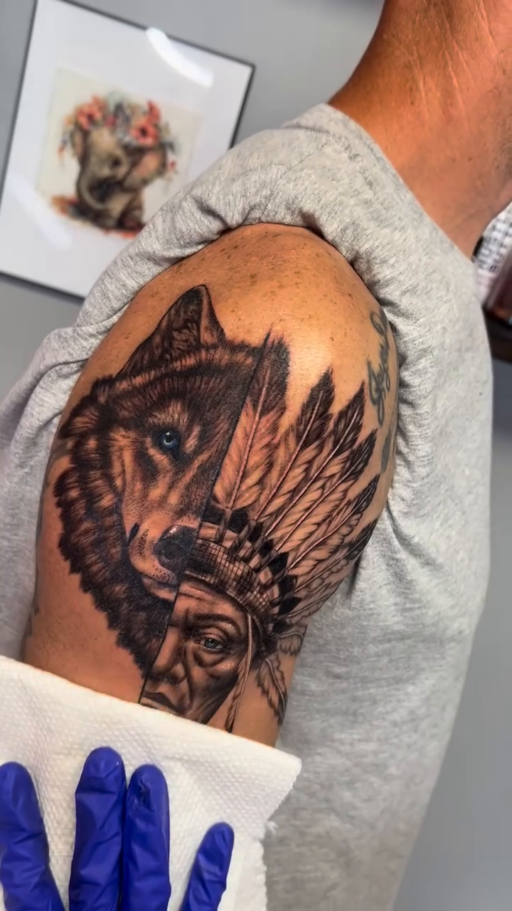 Wolf and native american chief realism tattoo by Adrian Michigan Tattoo Artist