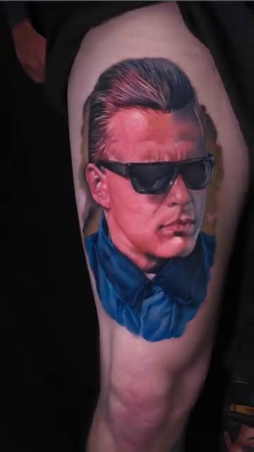 Portrait of a man with sunglasses tattoo on the upper arm by Joseph J Tattooart Denver, Lakewood, Colorado