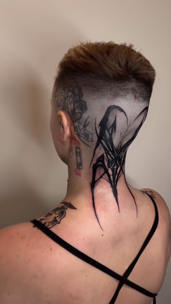 Abstract geometric design blackwork tattoo by Turk