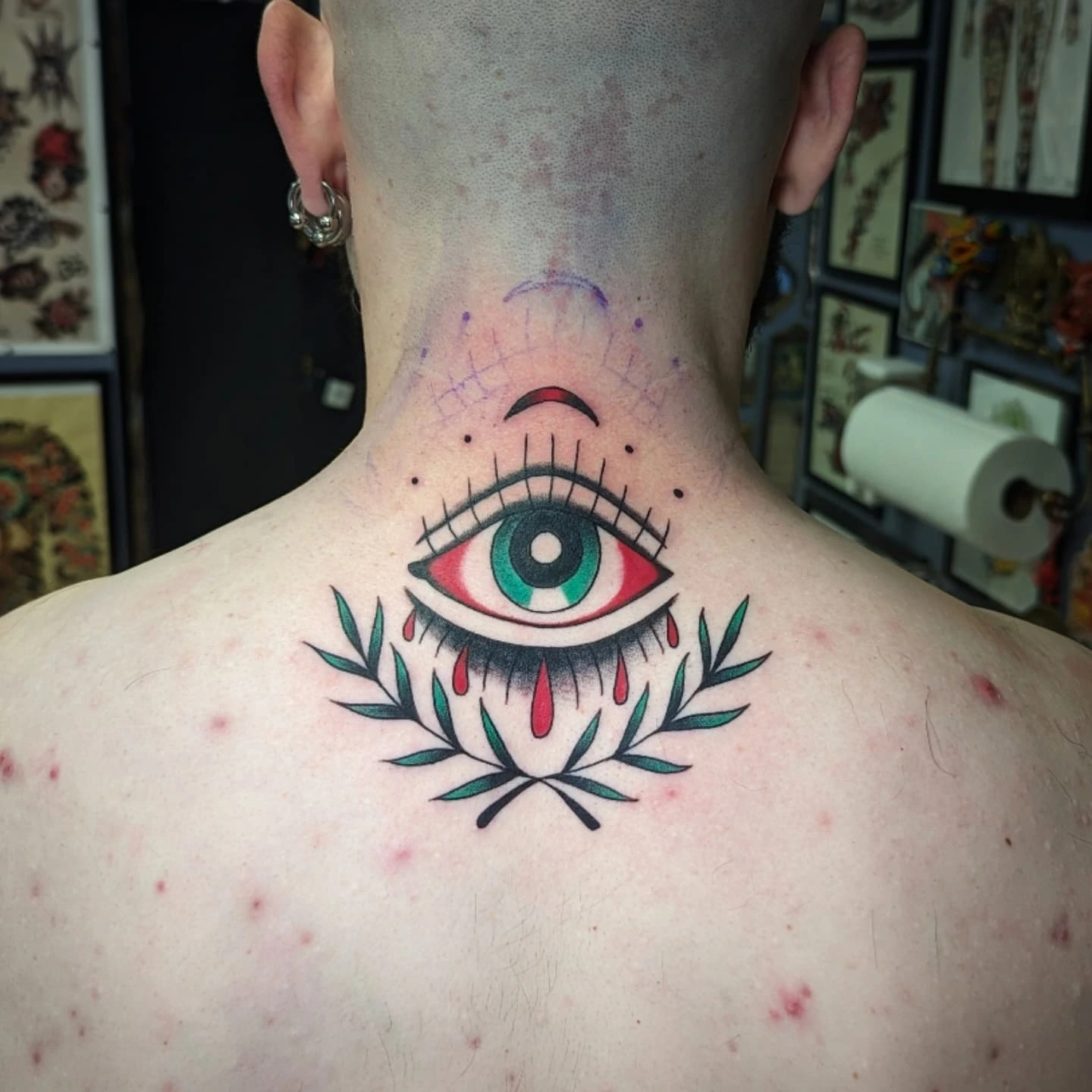 Eye with tears American traditional tattoo on the neck by joseph palladino