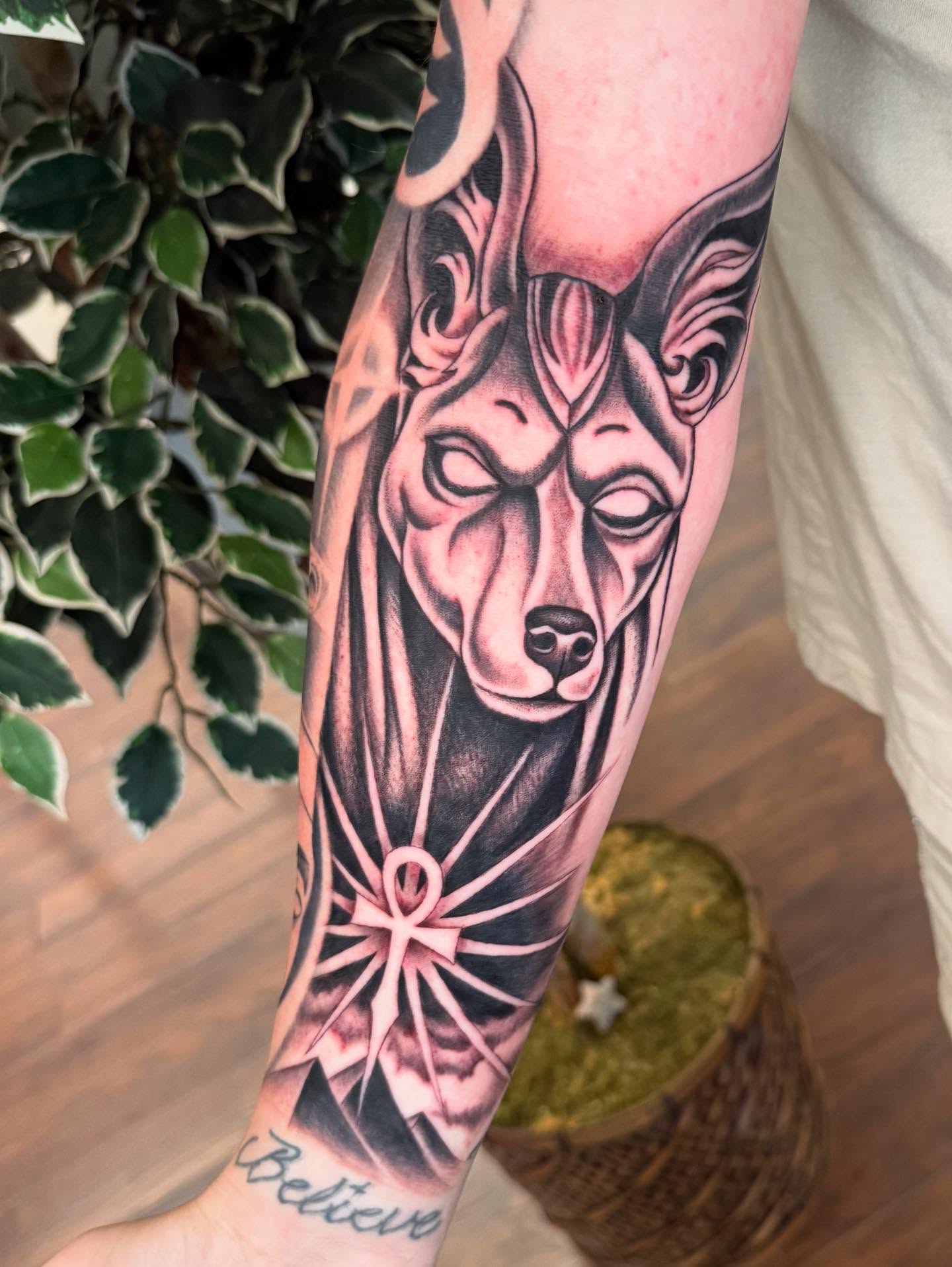 Wolf realism tattoo on the forearm by Michael Joy