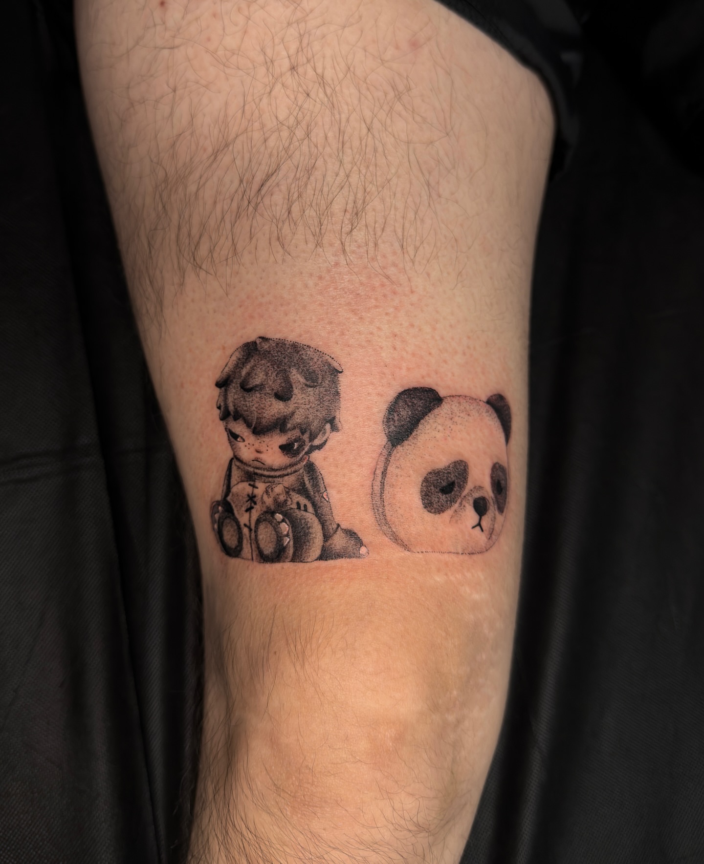 Child and panda dotwork tattoo on the forearm by šianca٠࣪ā