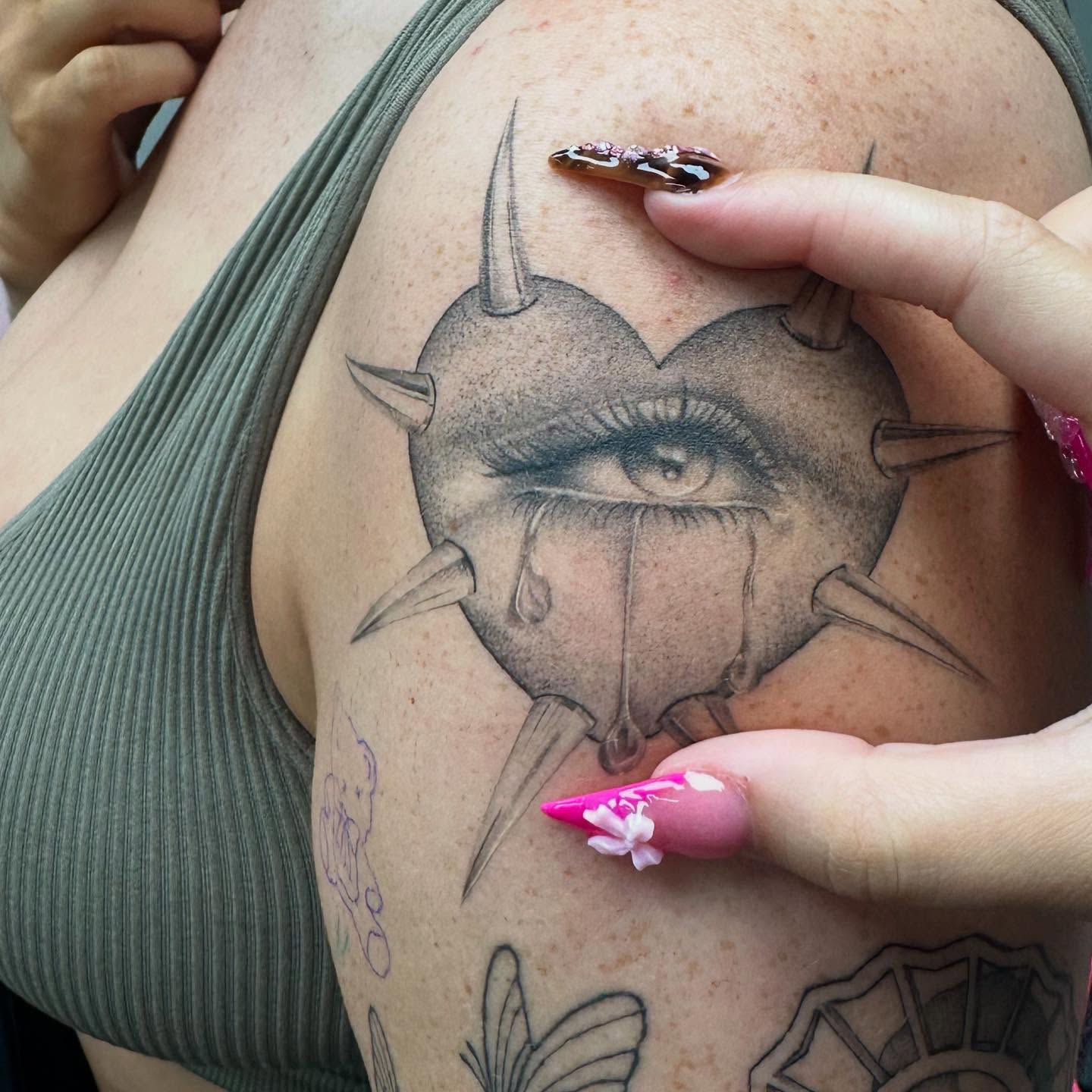 Eye with spikes dark realism tattoo on the shoulder by ๐๐๐๐ ๐๐๐๐