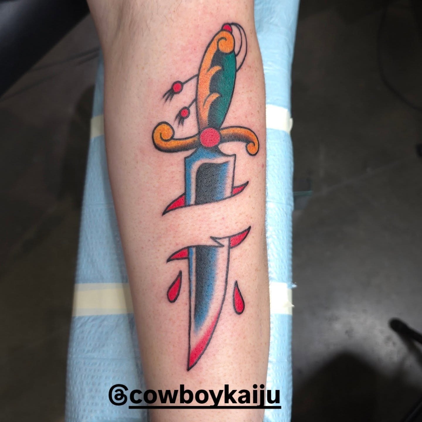 Knife new school tattoo on the forearm by Jared Green