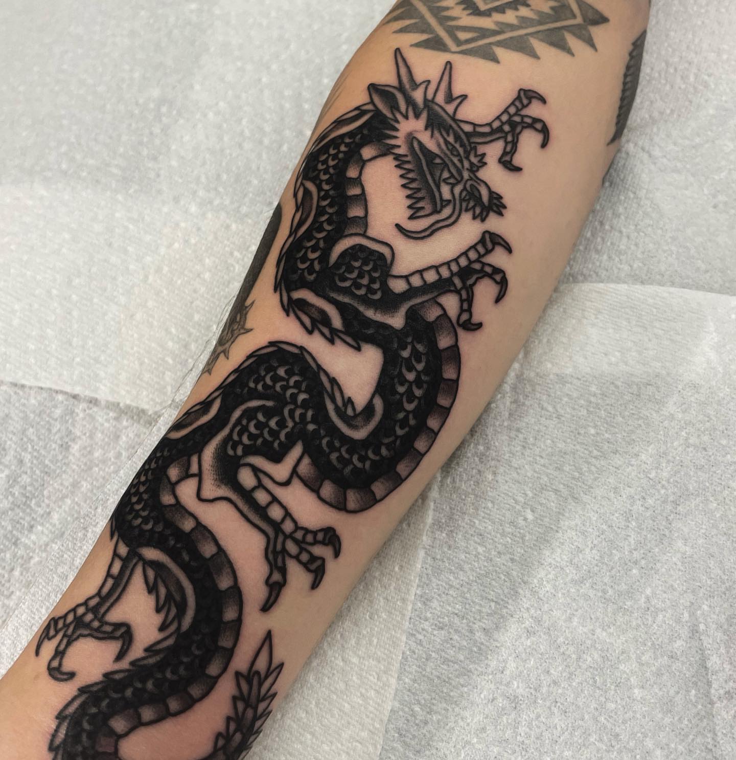 Tattoo by @jt_atkinstattoo — black_and_grey