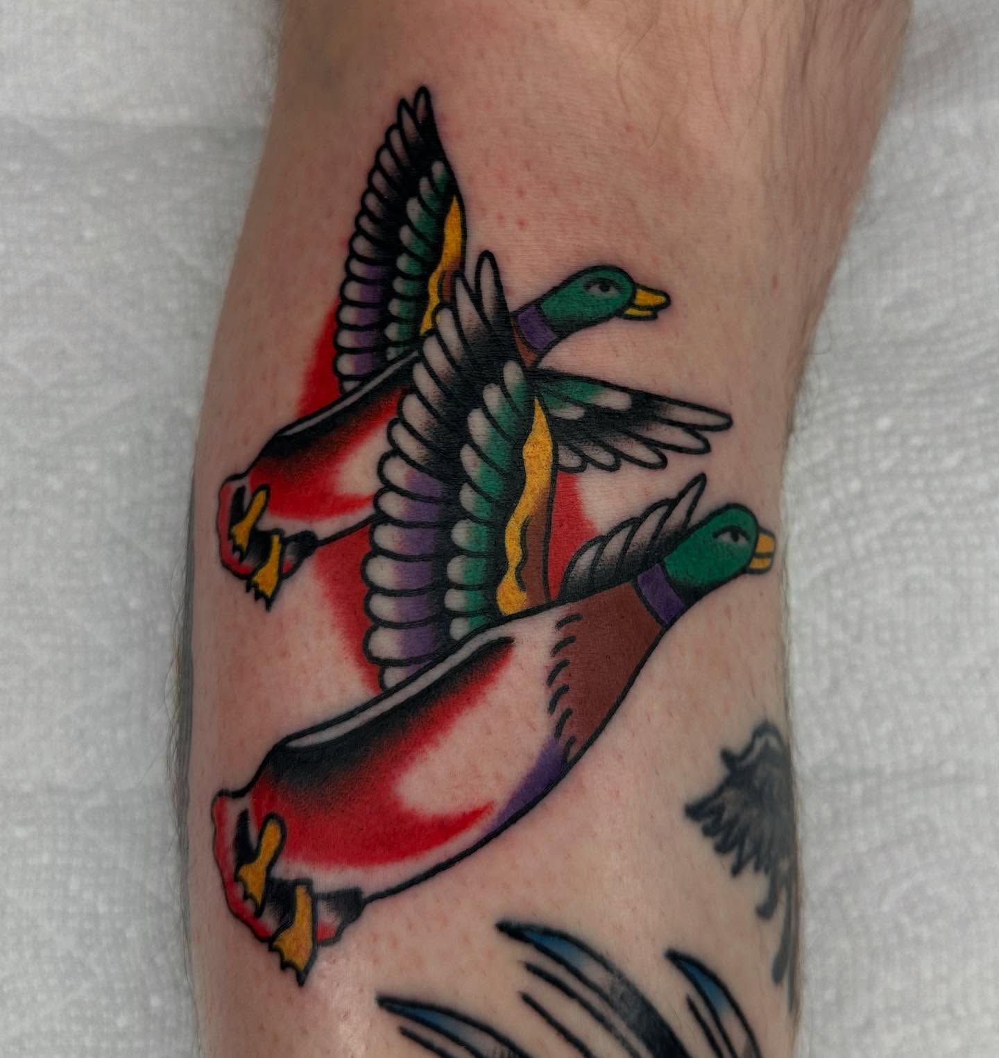 Ducks American traditional tattoo on the forearm by Keon Ostby, Tempe, Arizona