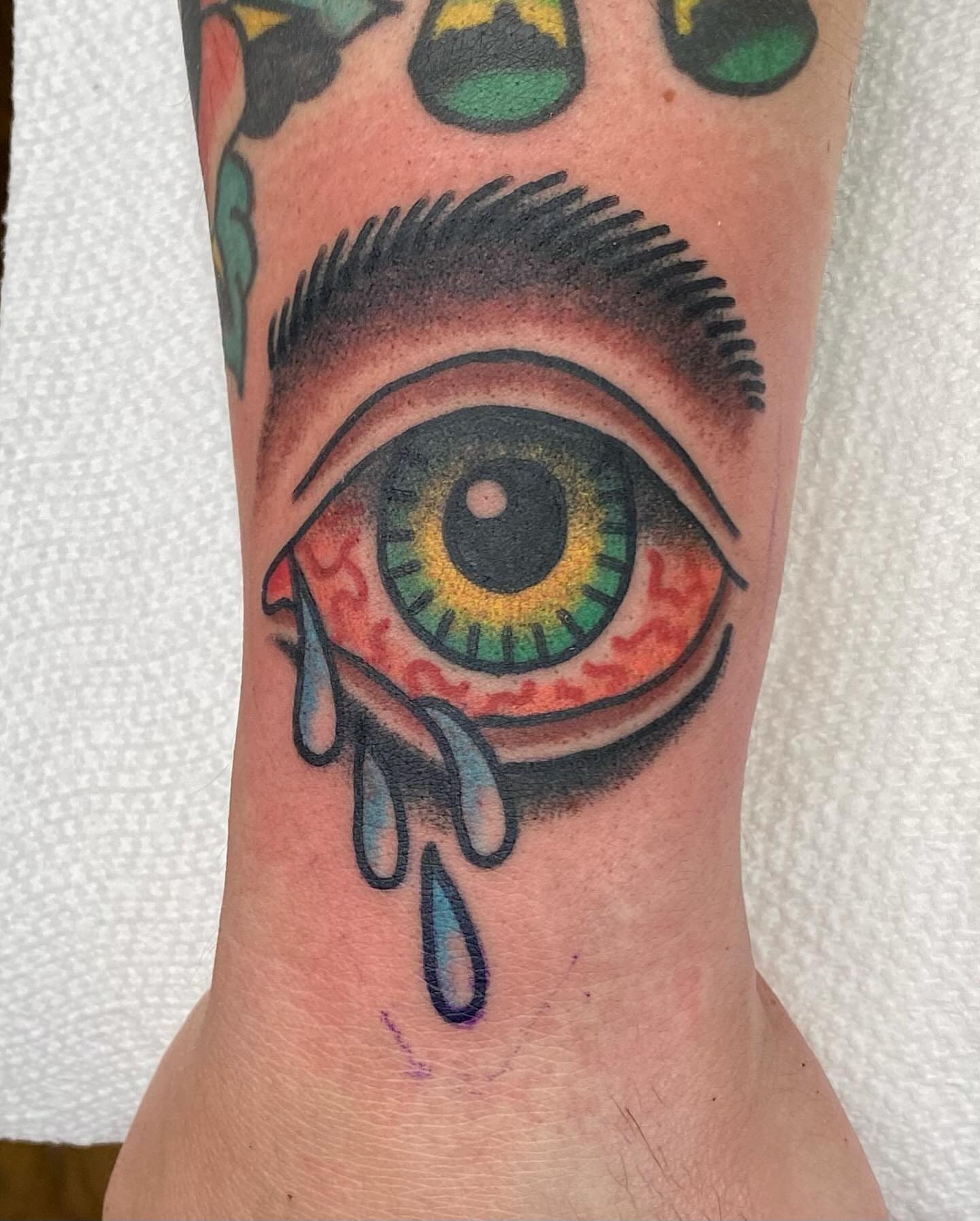 Tearful eye realism tattoo on the forearm by Jack, Knoxville, Tennessee