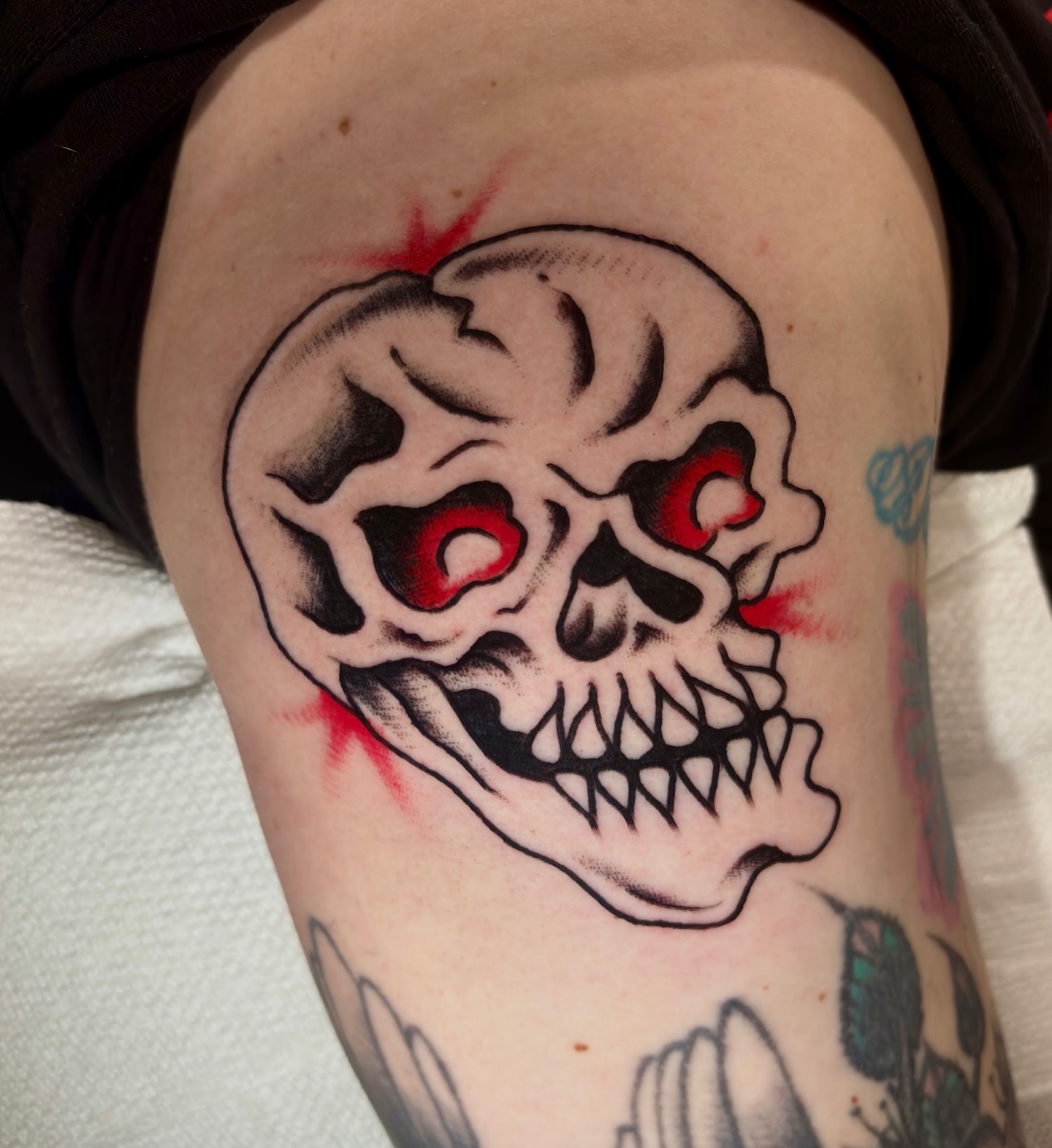 Skull American traditional tattoo on the forearm by Matt Elliott, Murfreesboro, Tennessee