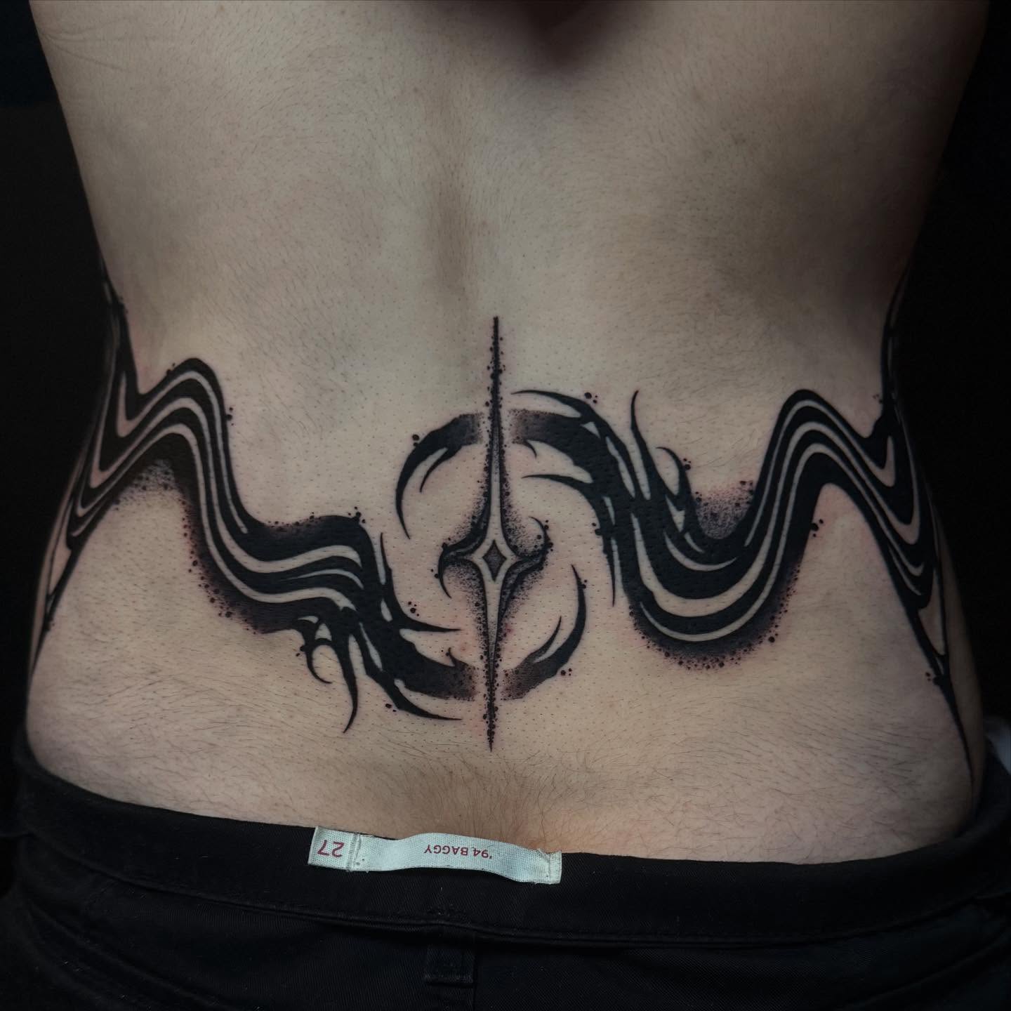 Abstract design dotwork tattoo on the torso by Dylan Orbock, Berkeley, California