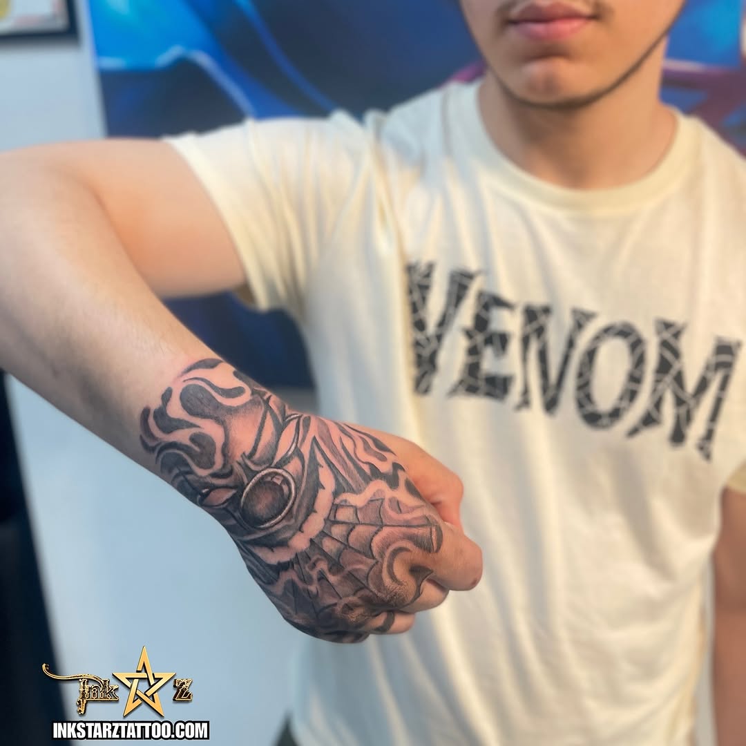 Spider and eye surrealism tattoo on the forearm by Jayme