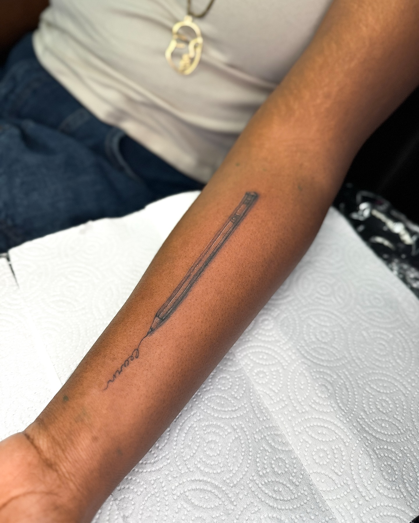 Needle black and grey tattoo on the forearm by Natasha Rachel Fineline Tattoos Nashville