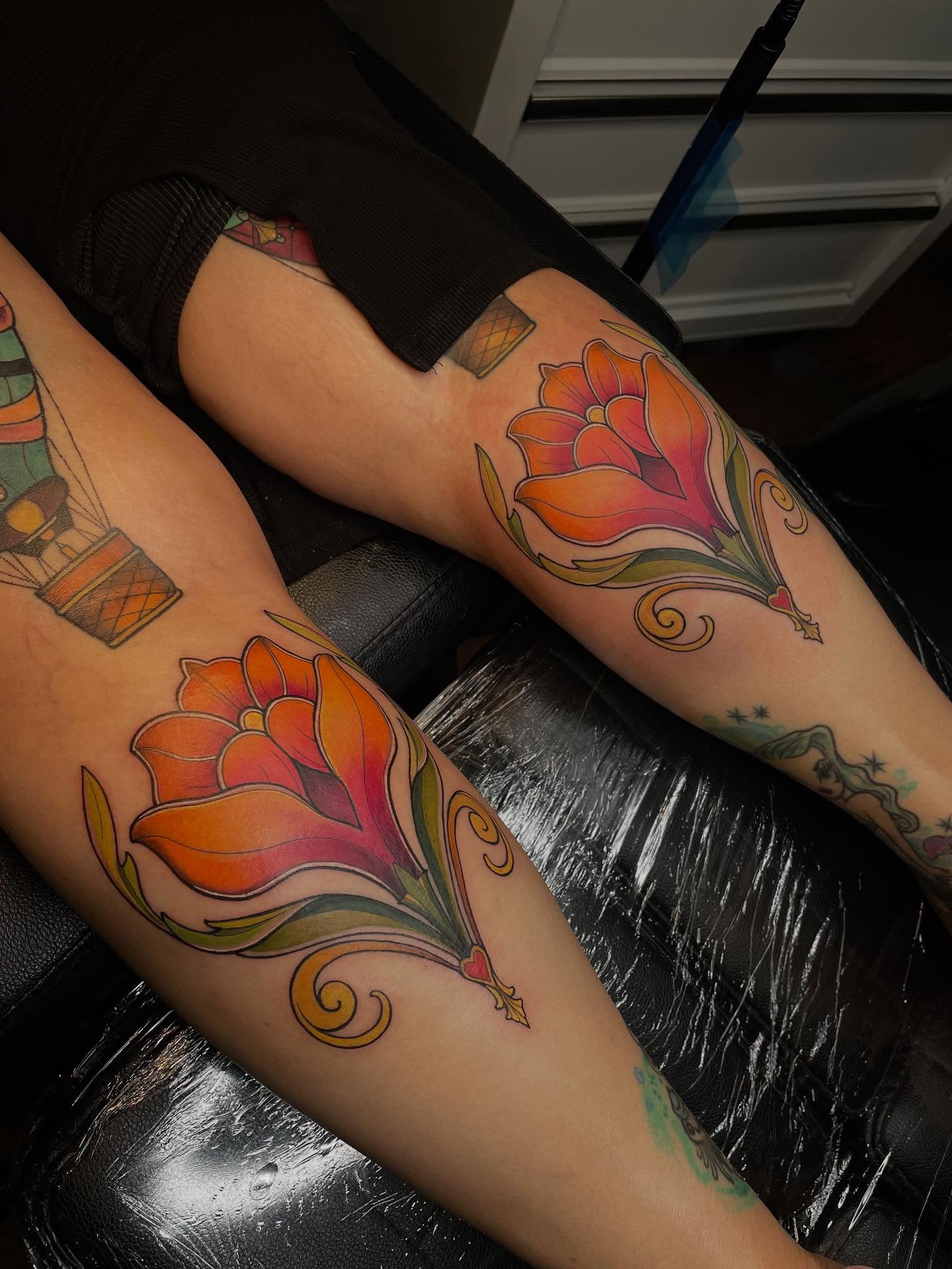 Floral design American traditional tattoo on the leg by Lauren Sisouphanh, Canton, Ohio