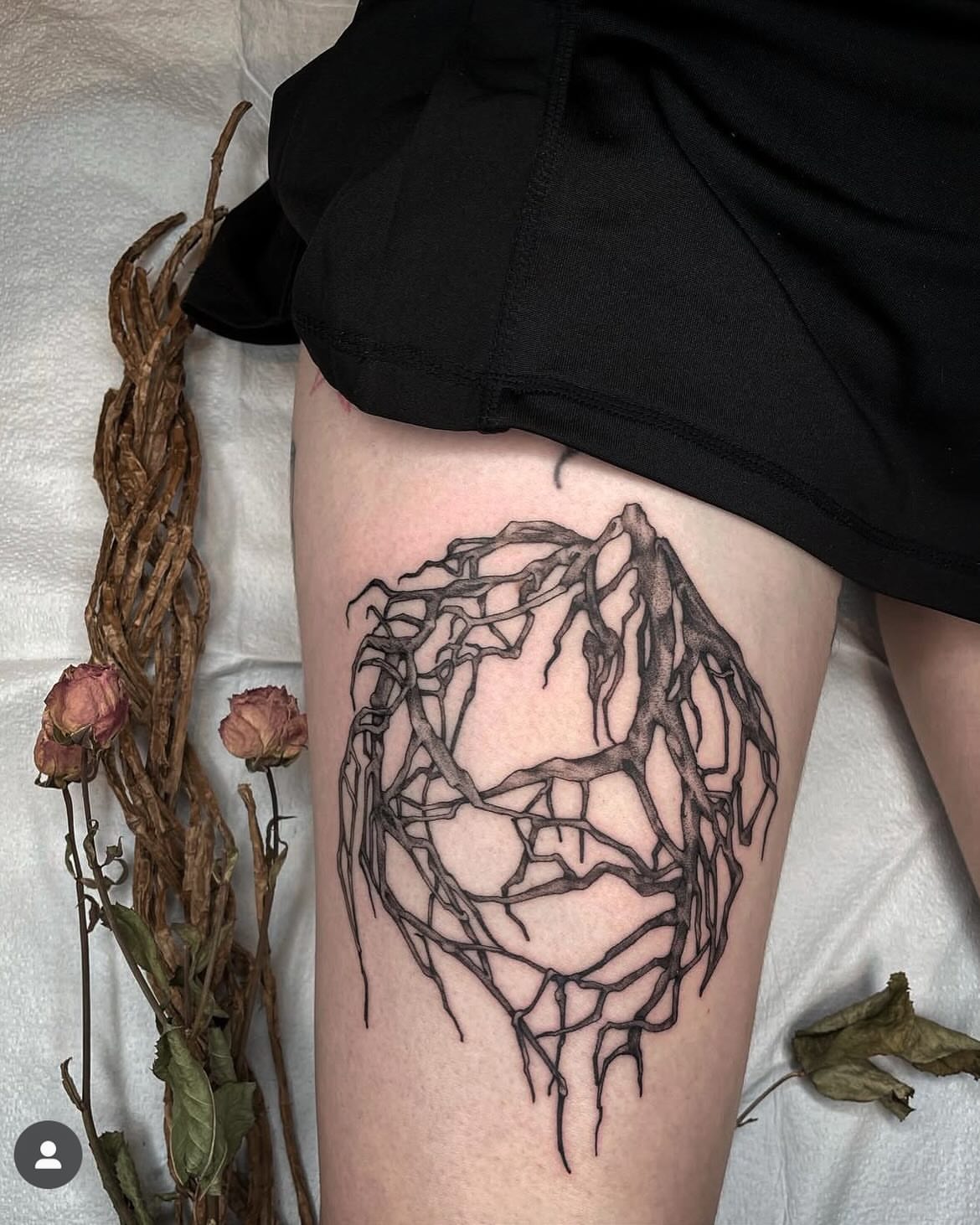 Root ball black and grey tattoo on the thigh by Jamie Draven 🐺