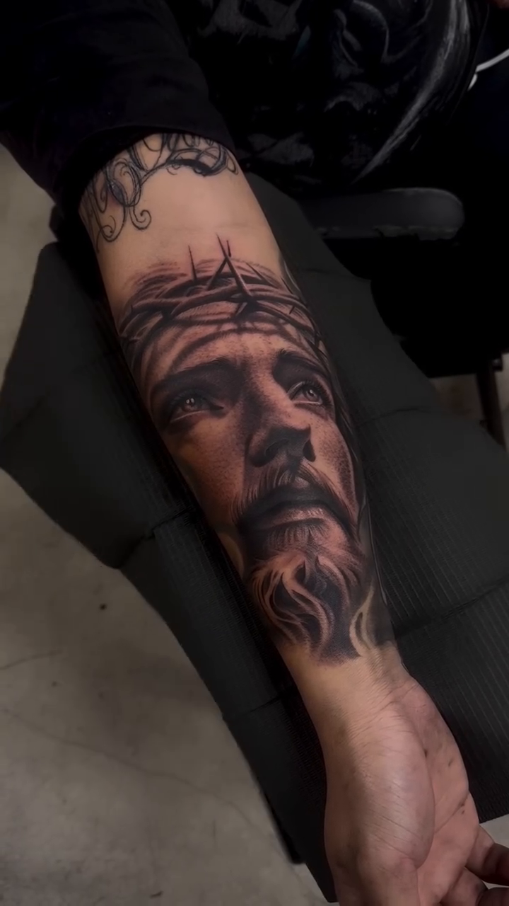 Jesus Christ portrait realism tattoo by Jason Martinez