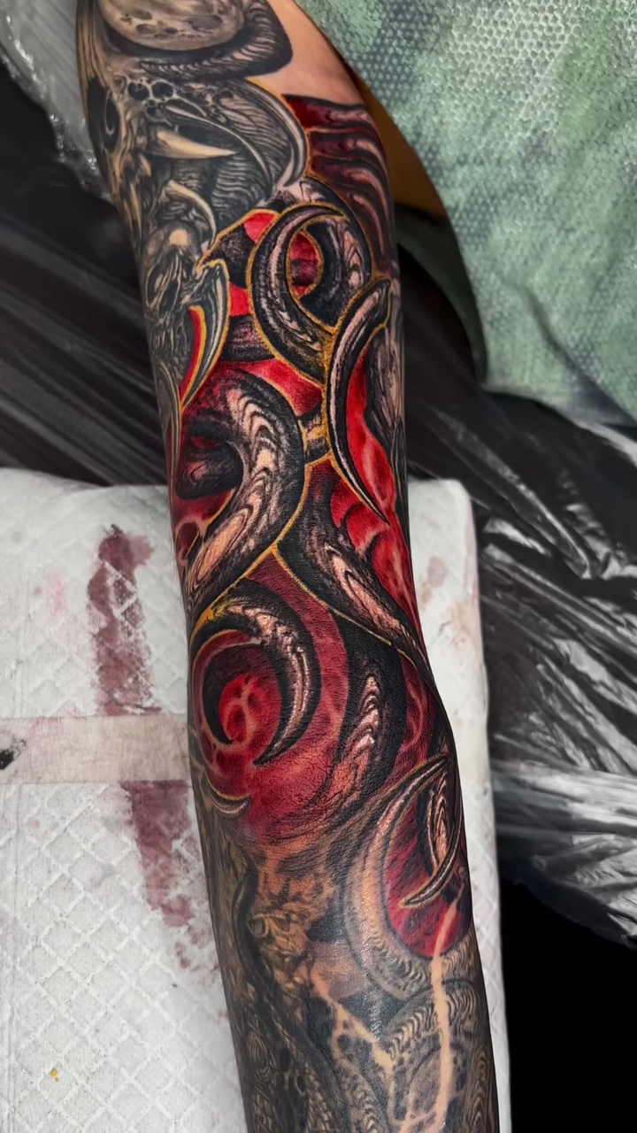 Biomechanical octopus tentacles dark realism tattoo by Dark tattoo